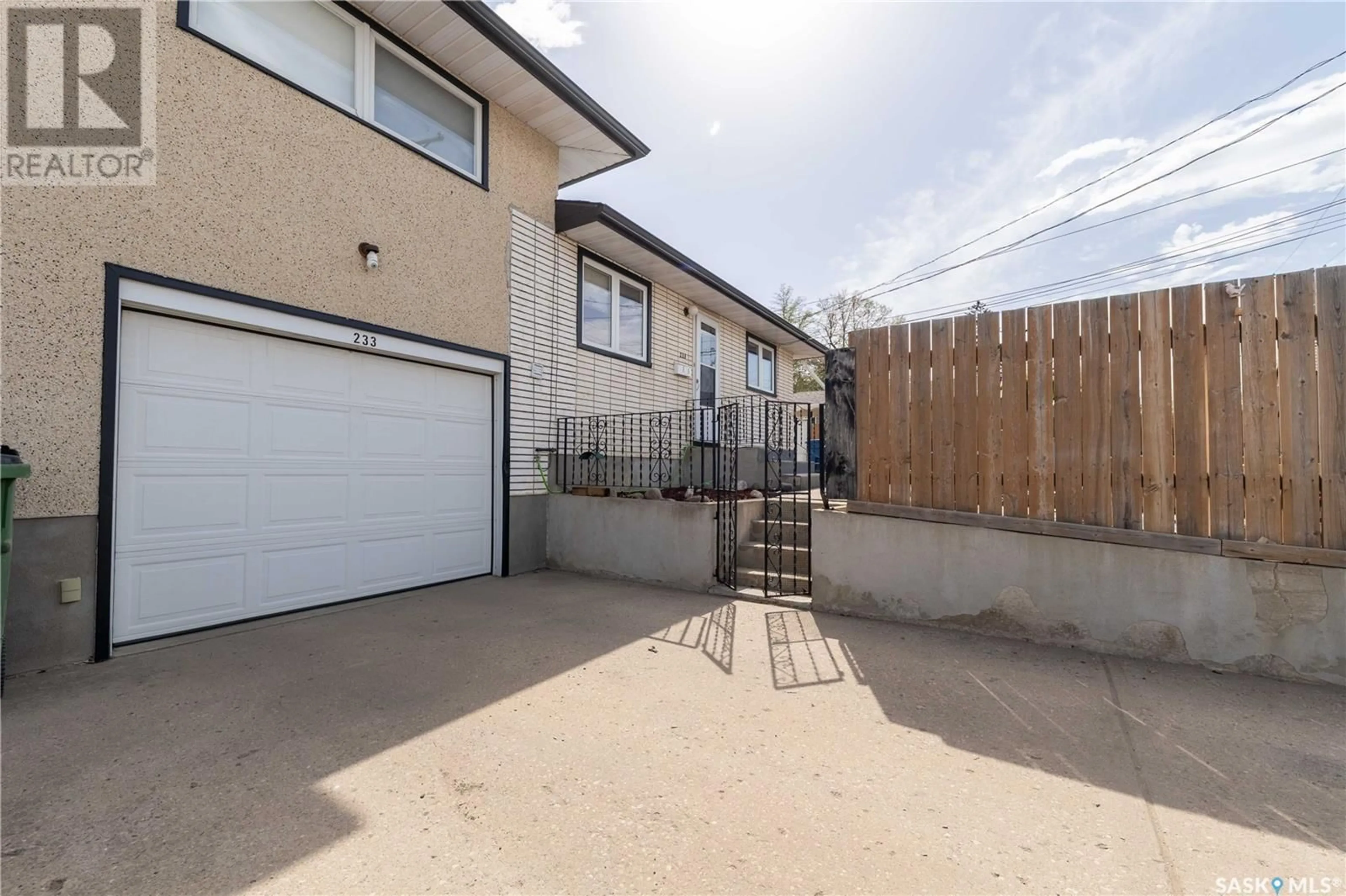 Patio, street for 233 CARIBOU STREET E, Moose Jaw Saskatchewan S6H6G4