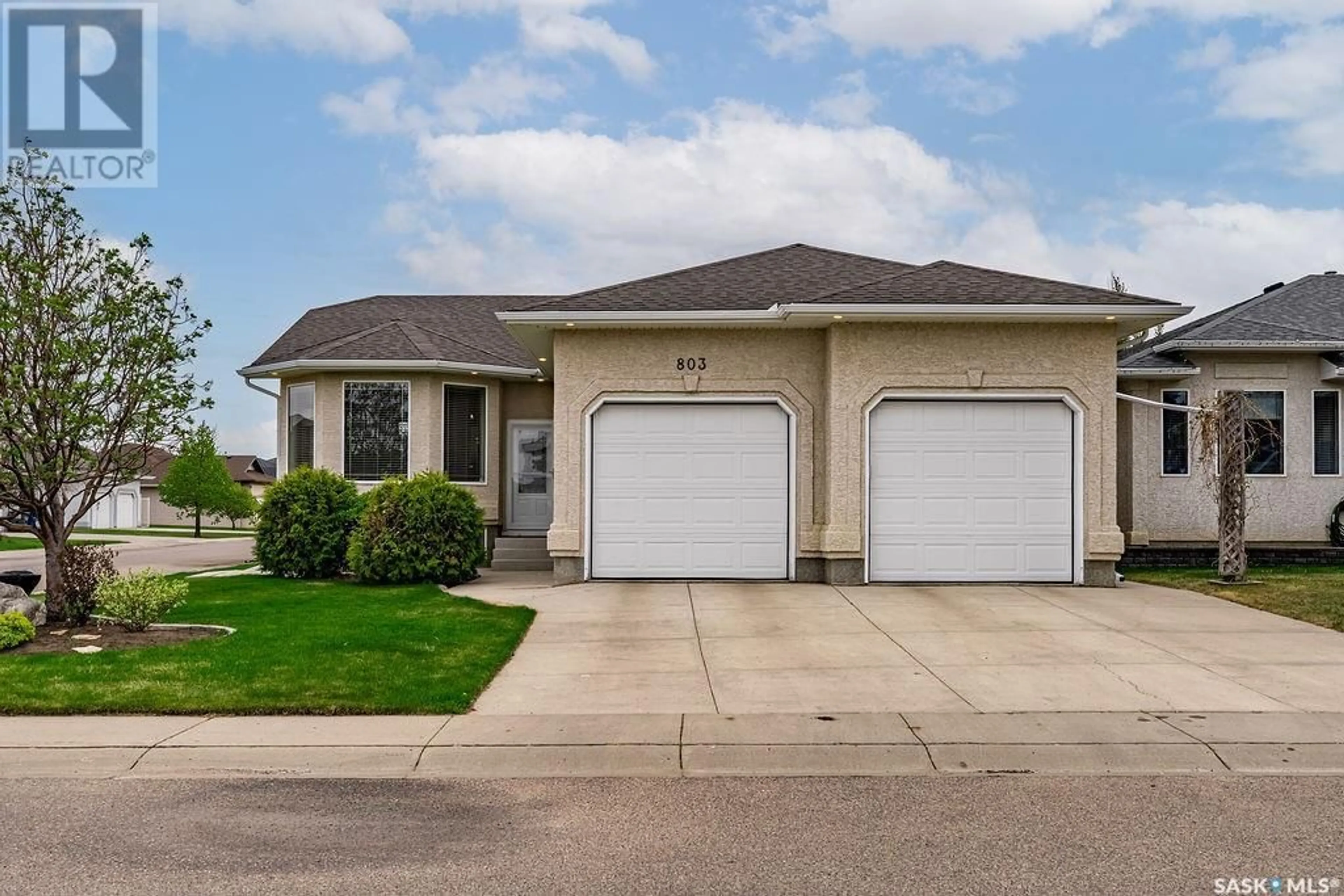 Home with vinyl exterior material, street for 803 CARR TERRACE, Saskatoon Saskatchewan S7S1L9