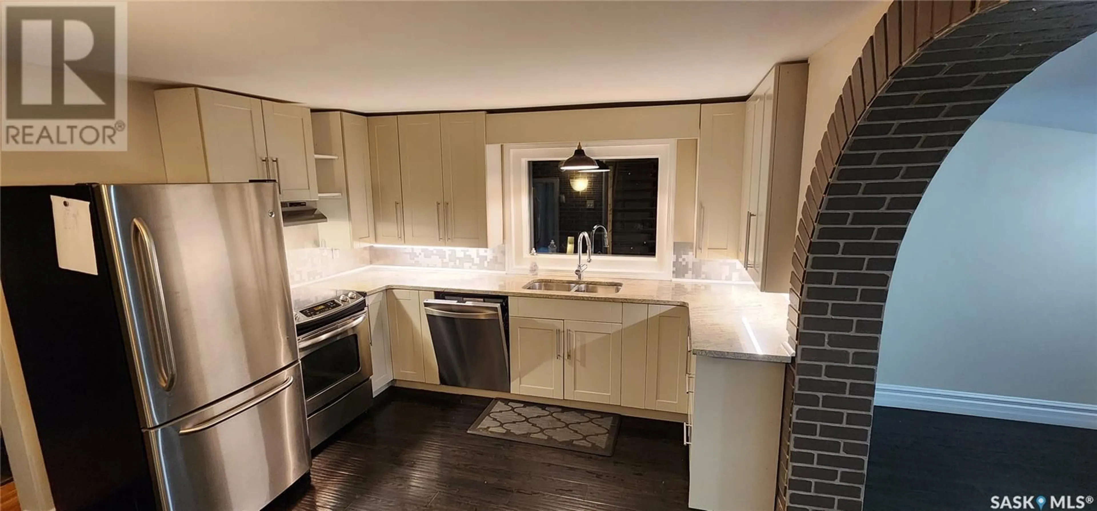 Open concept kitchen, ceramic/tile floor for 214 I AVENUE, Saskatoon Saskatchewan S7M1X9