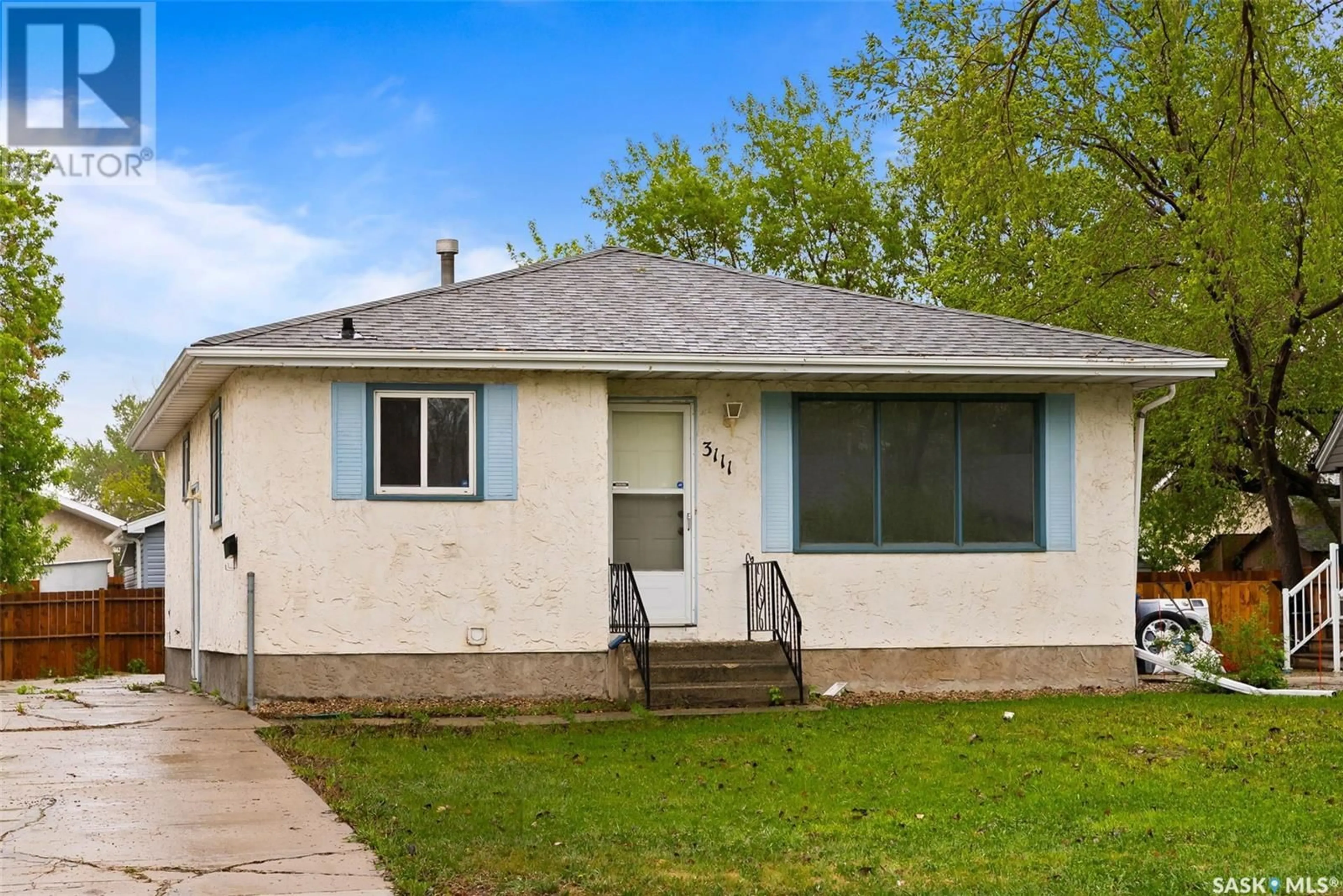 Home with vinyl exterior material, street for E - 3111 DEWDNEY AVENUE, Regina Saskatchewan S4N5K3