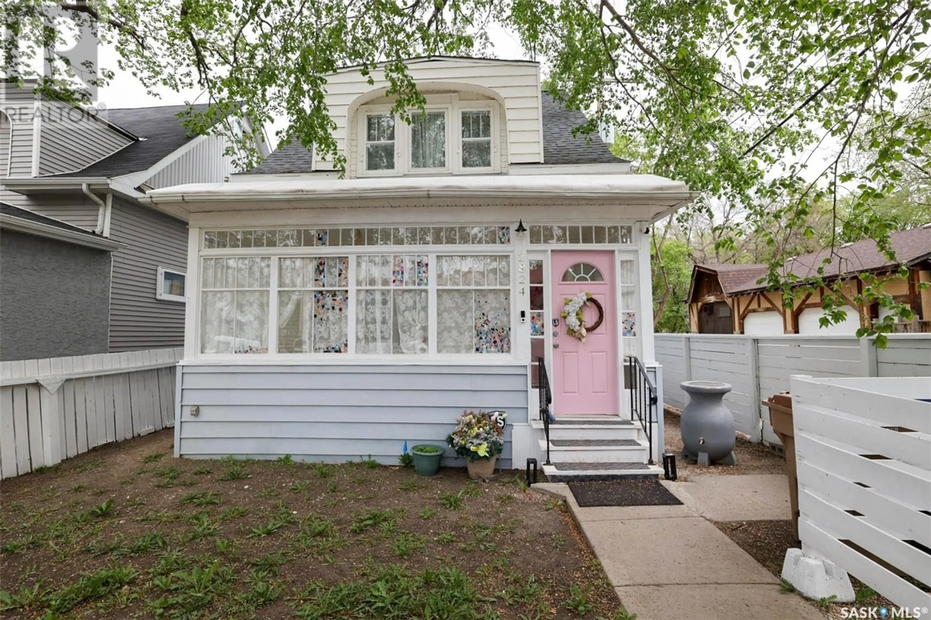 Home with vinyl exterior material, street for 2824 12TH AVENUE, Regina Saskatchewan S4T1J4