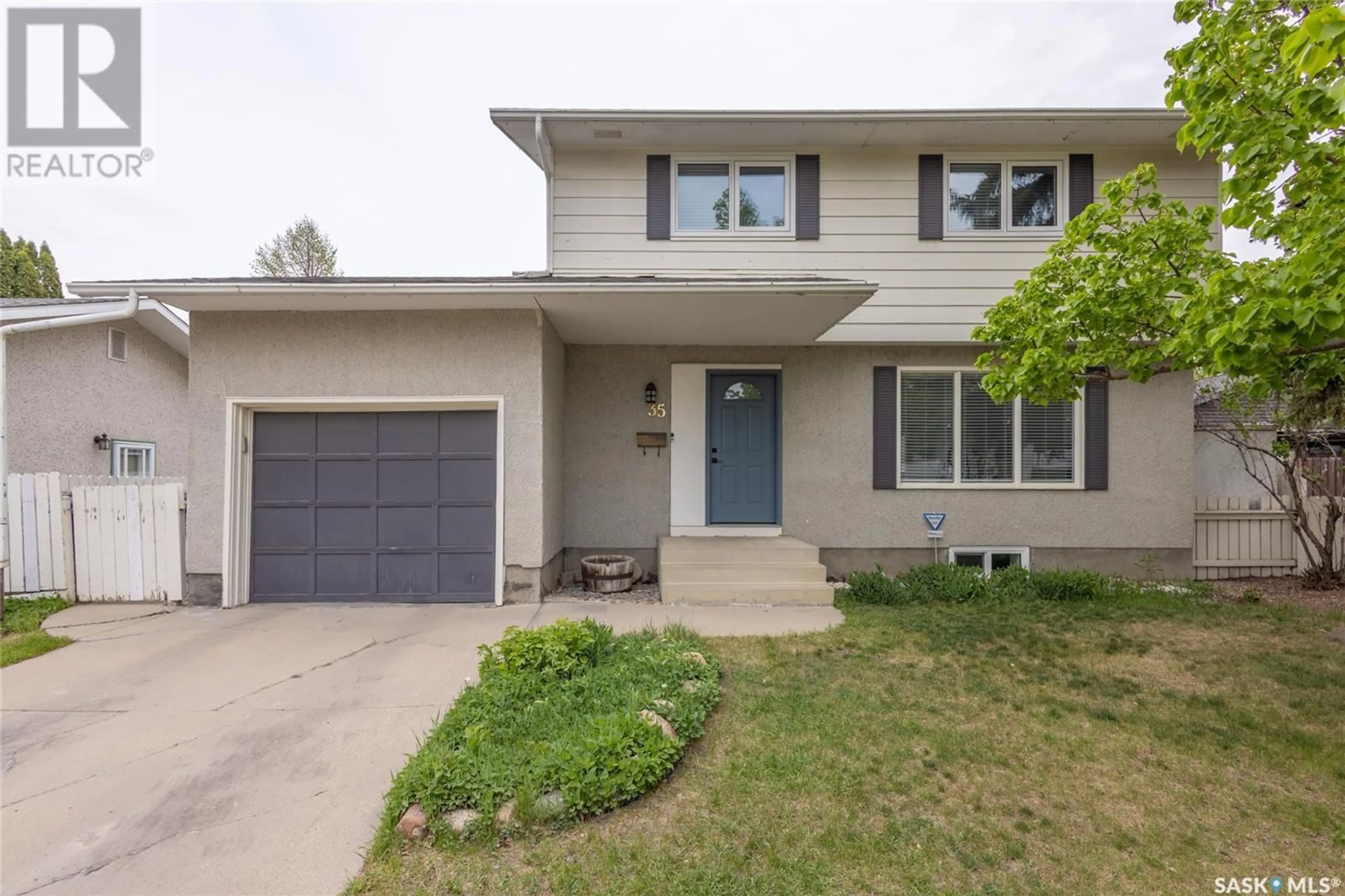 Home with vinyl exterior material, street for 35 TUCKER CRESCENT, Saskatoon Saskatchewan S7H3H4