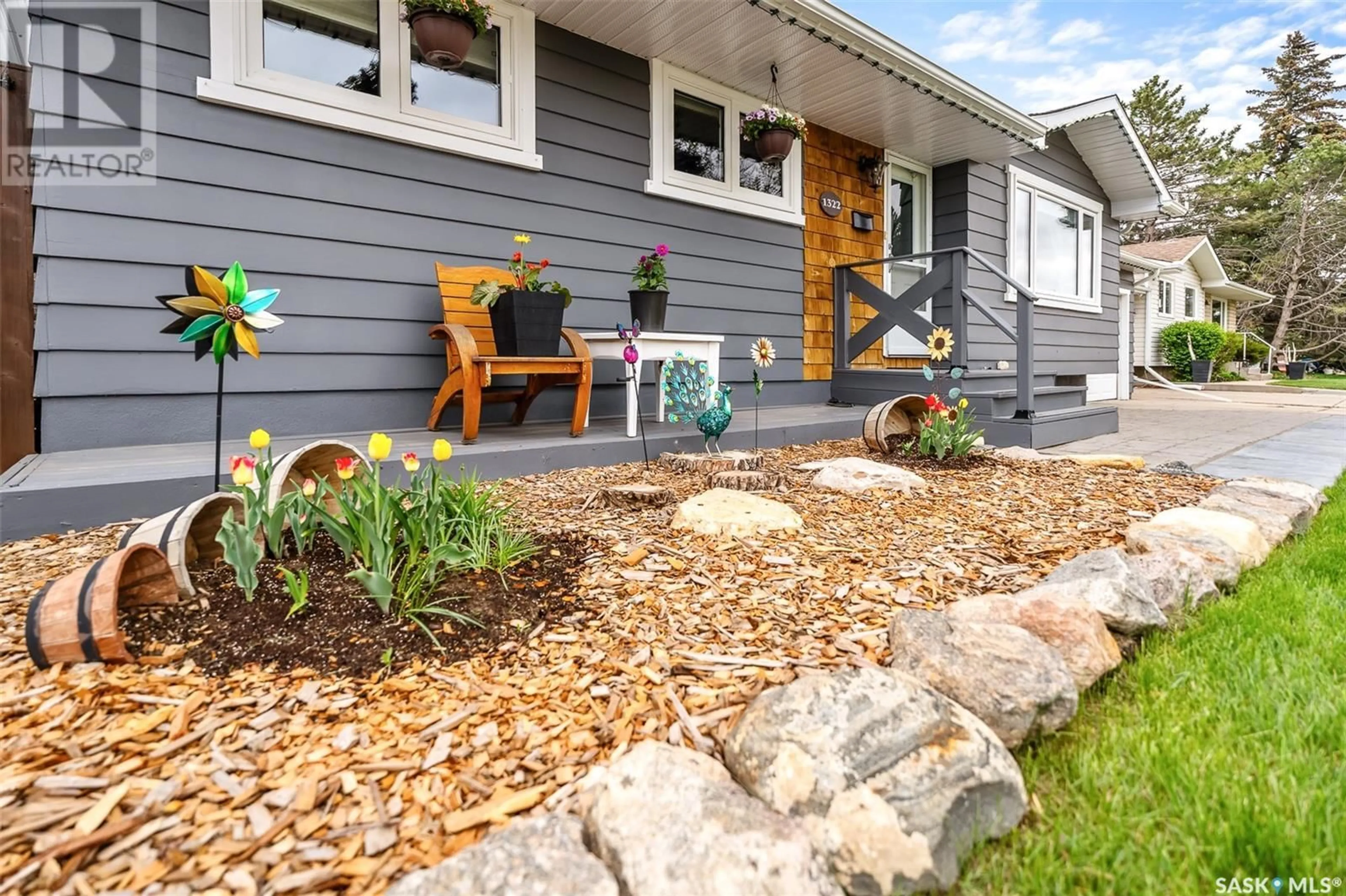 Home with vinyl exterior material, street for 1322 KING CRESCENT, Moose Jaw Saskatchewan S6H3G2