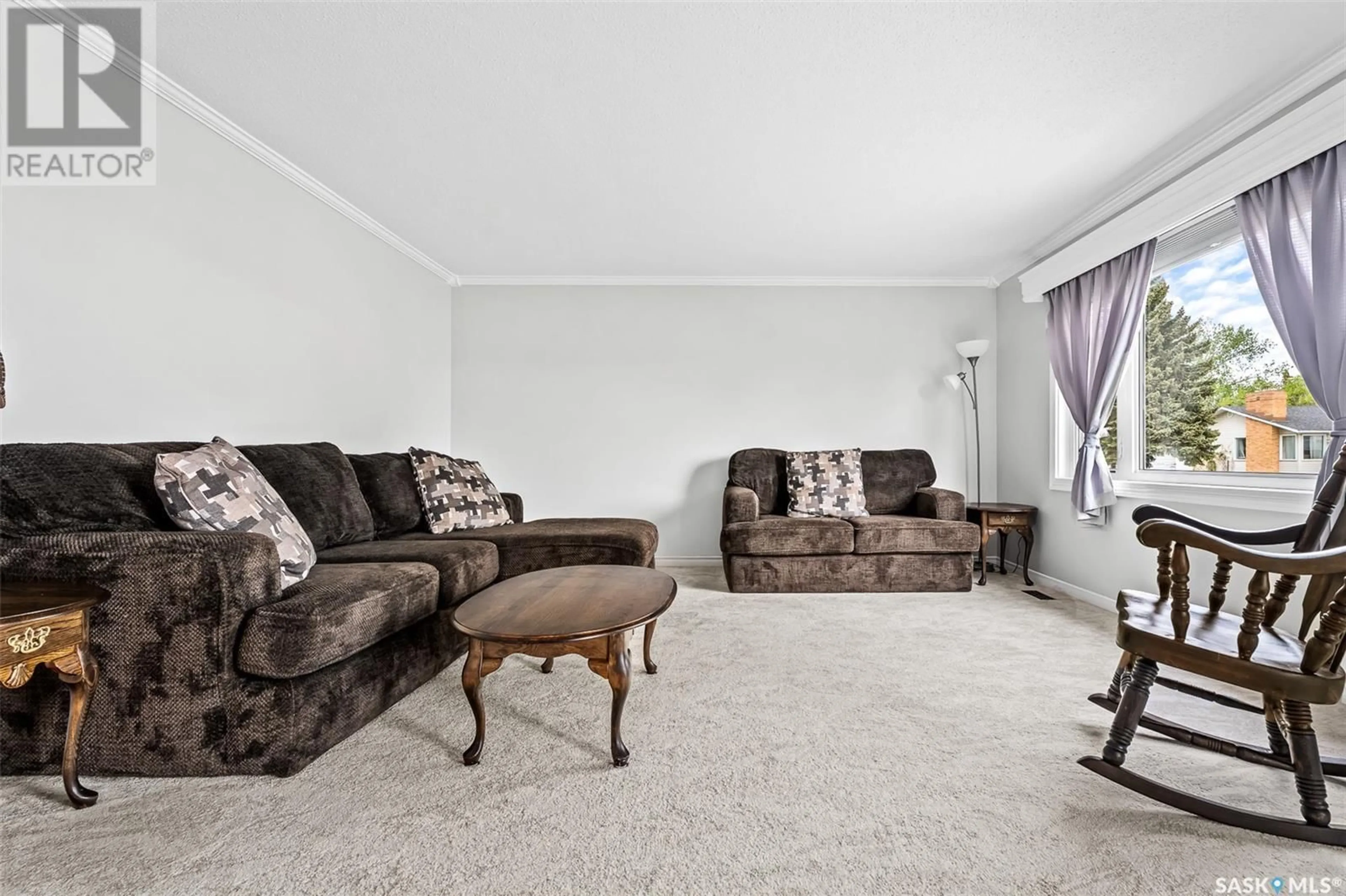 Living room with furniture, carpet floor for 1322 KING CRESCENT, Moose Jaw Saskatchewan S6H3G2