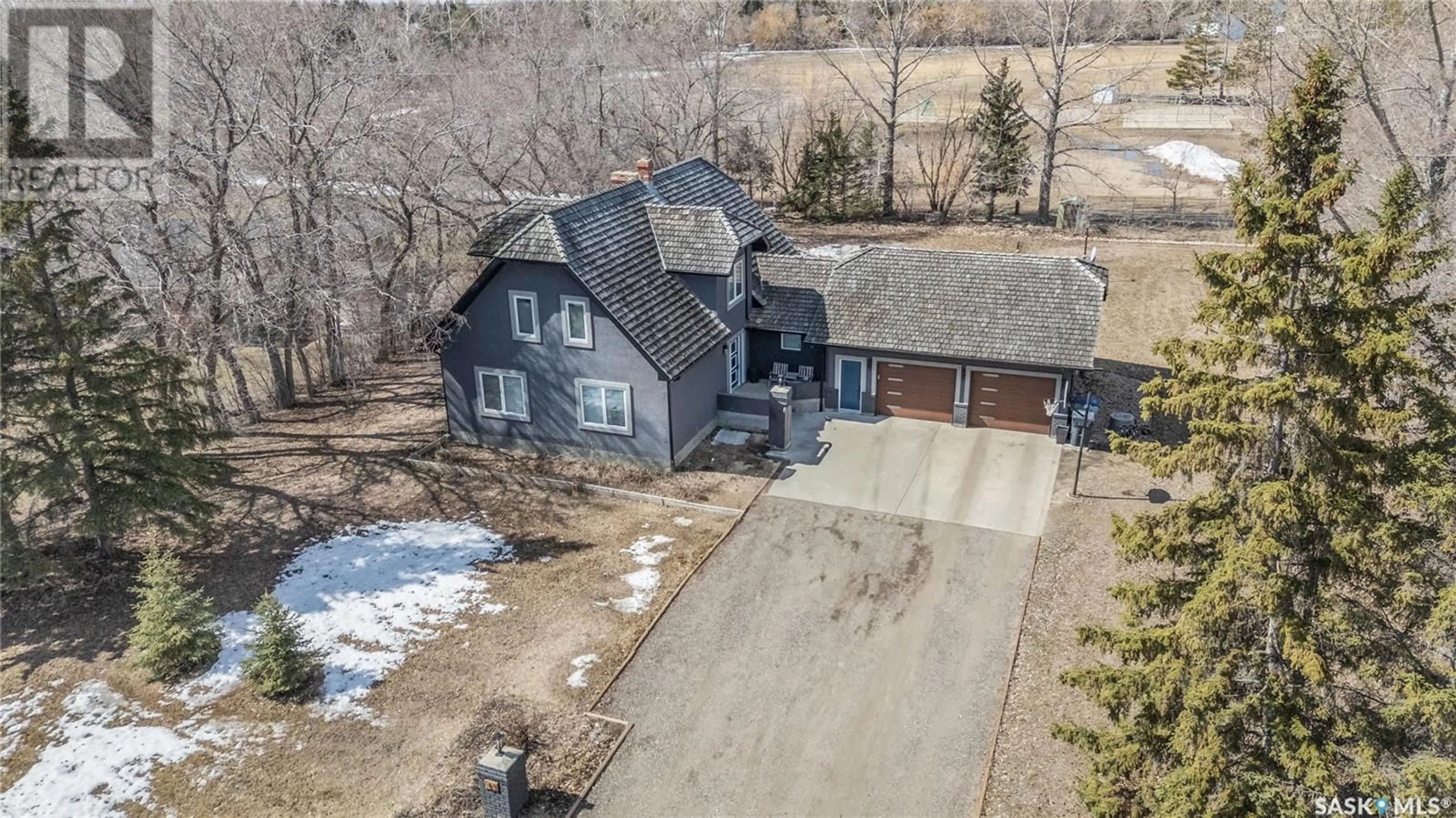 A pic from outside/outdoor area/front of a property/back of a property/a pic from drone, street for 31 RIDGEDALE BAY, White City Saskatchewan S4L5B1