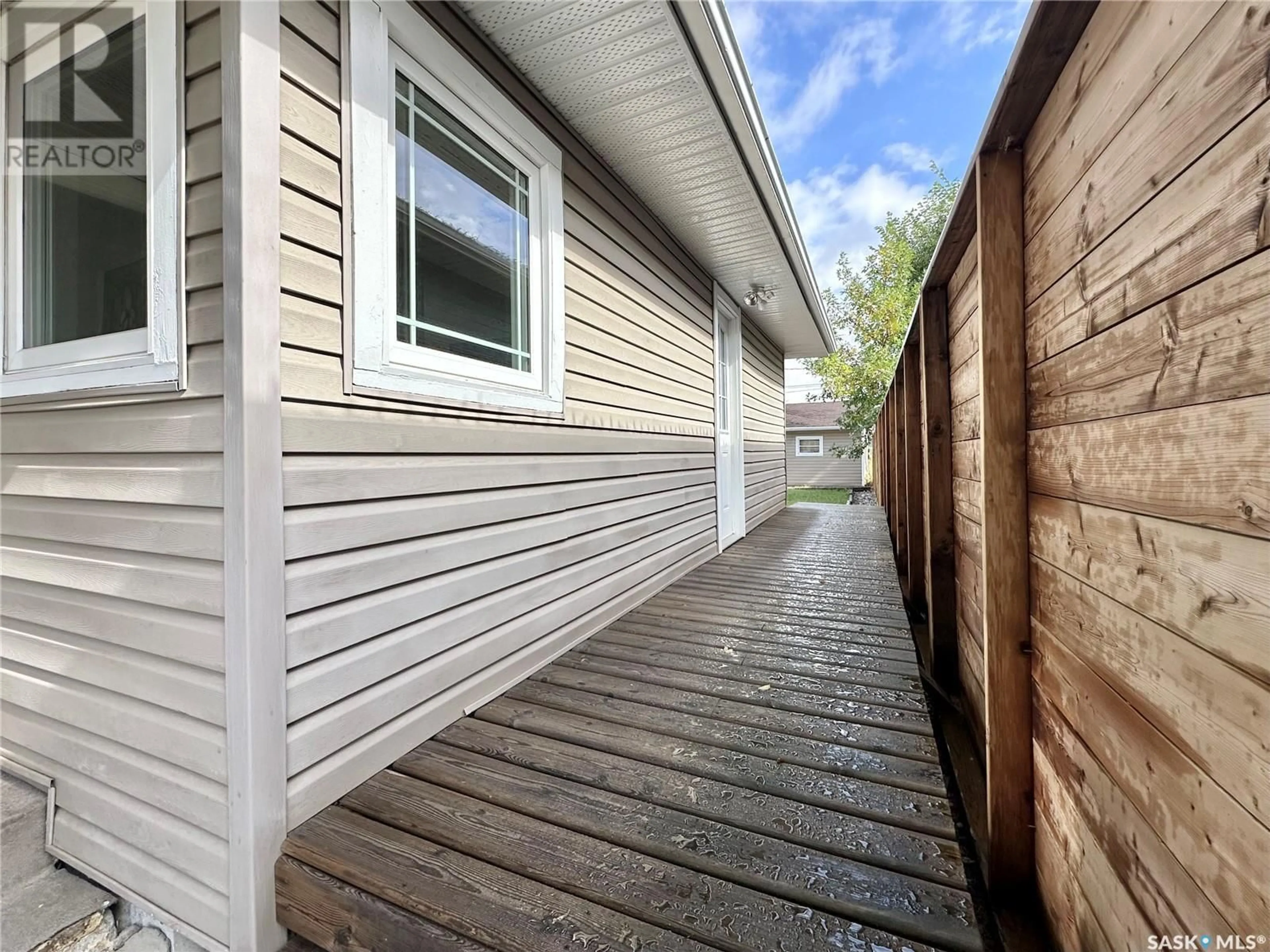 Home with vinyl exterior material, street for 2125 FLEURY STREET, Regina Saskatchewan S4N2M3