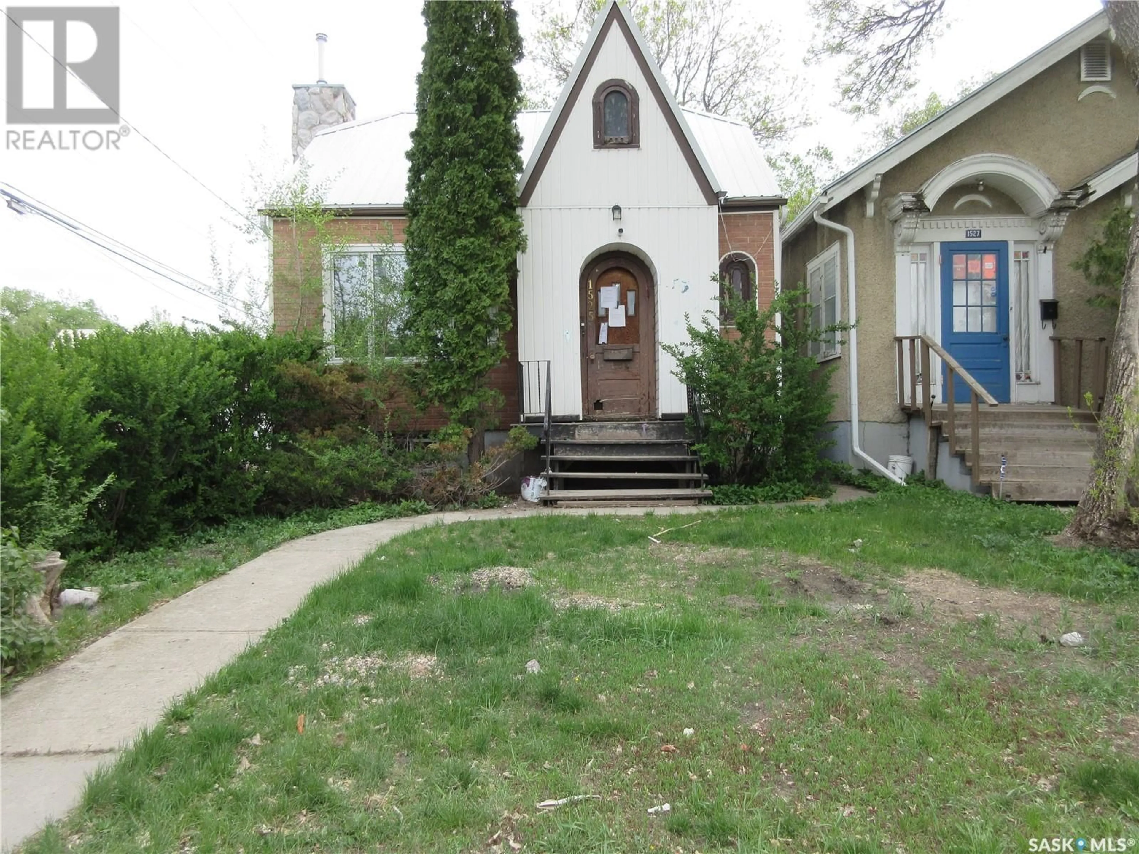 Home with brick exterior material, street for 1525 MCTAVISH STREET, Regina Saskatchewan S4T3W5