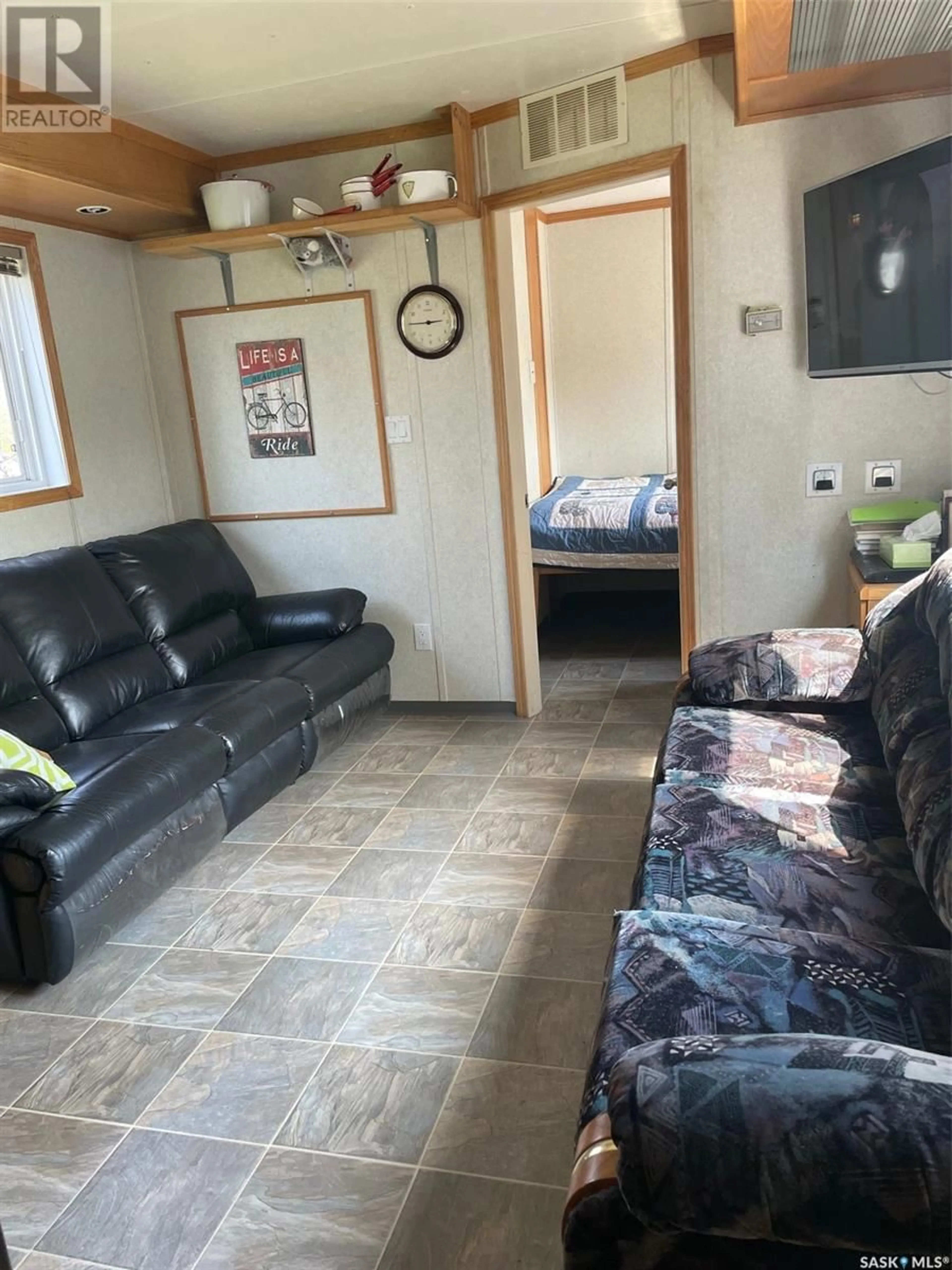 Living room with furniture, unknown for 551 WILLOW AVENUE, Carragana Saskatchewan S0E0K0