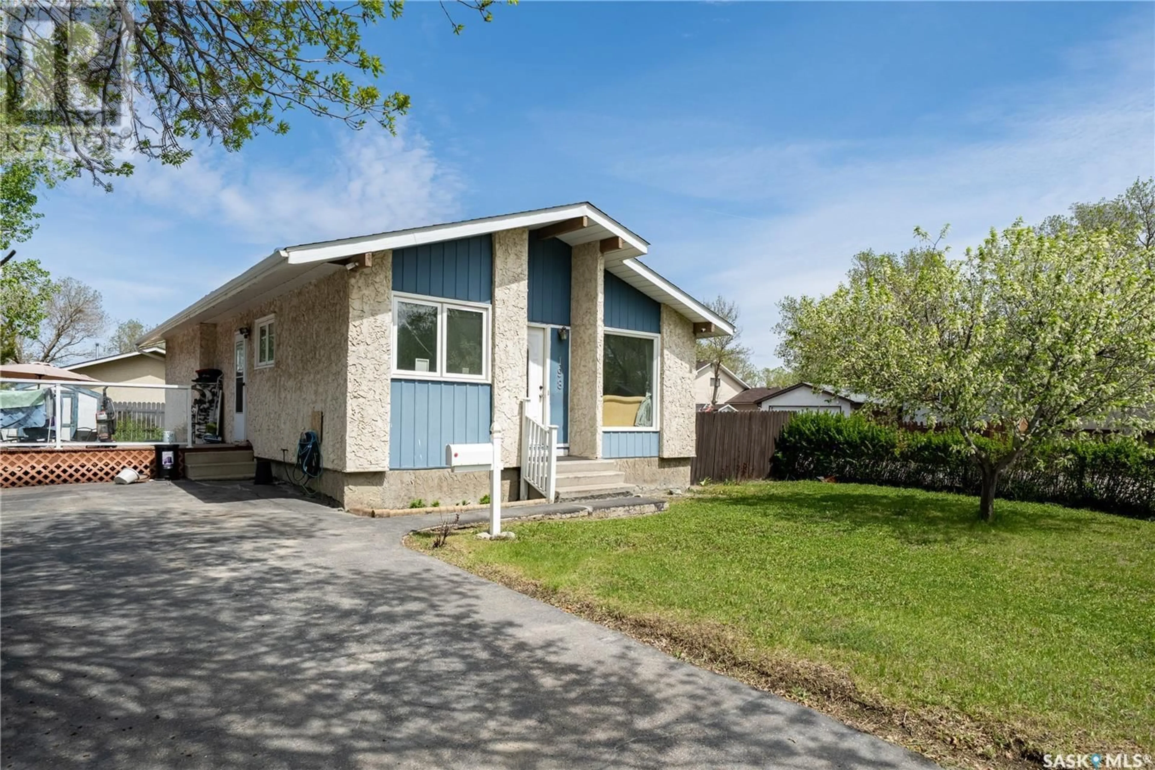 Home with vinyl exterior material, street for 198 THOMSON AVENUE, Regina Saskatchewan S4N5L3