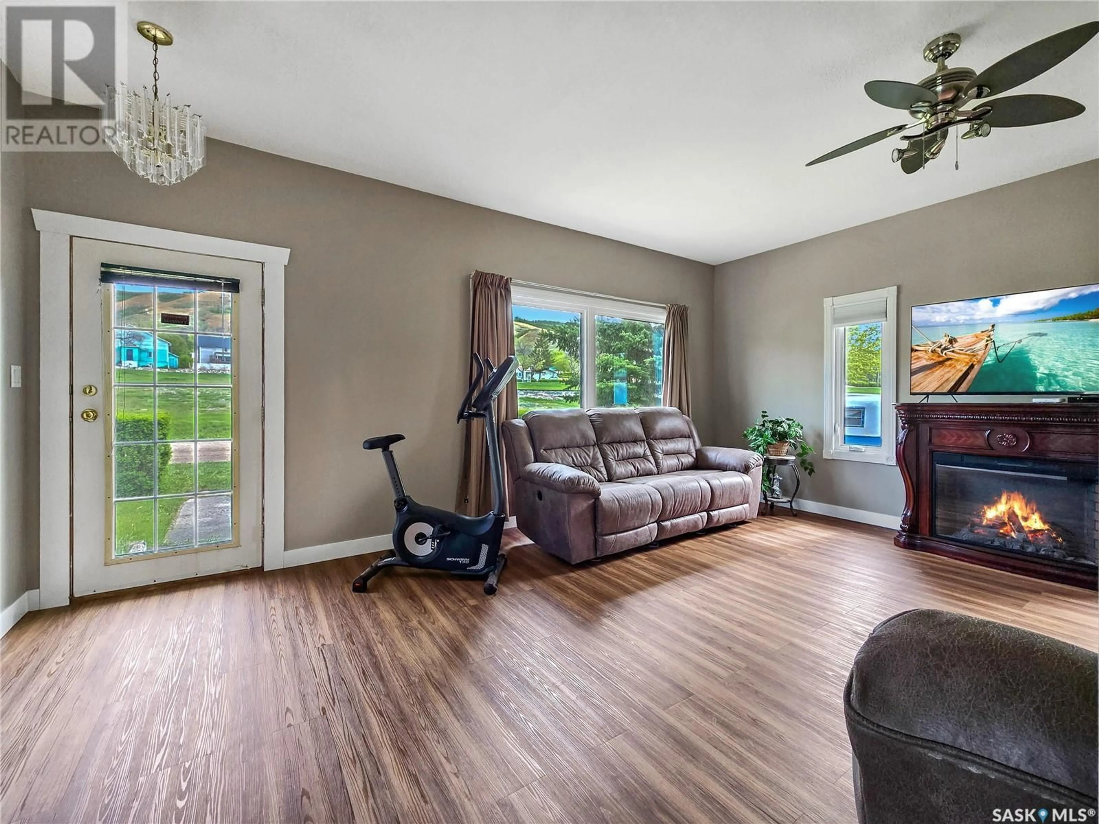 Living room with furniture, wood/laminate floor for 6 ST PATRICK STREET, Lebret Saskatchewan S0G2Y0