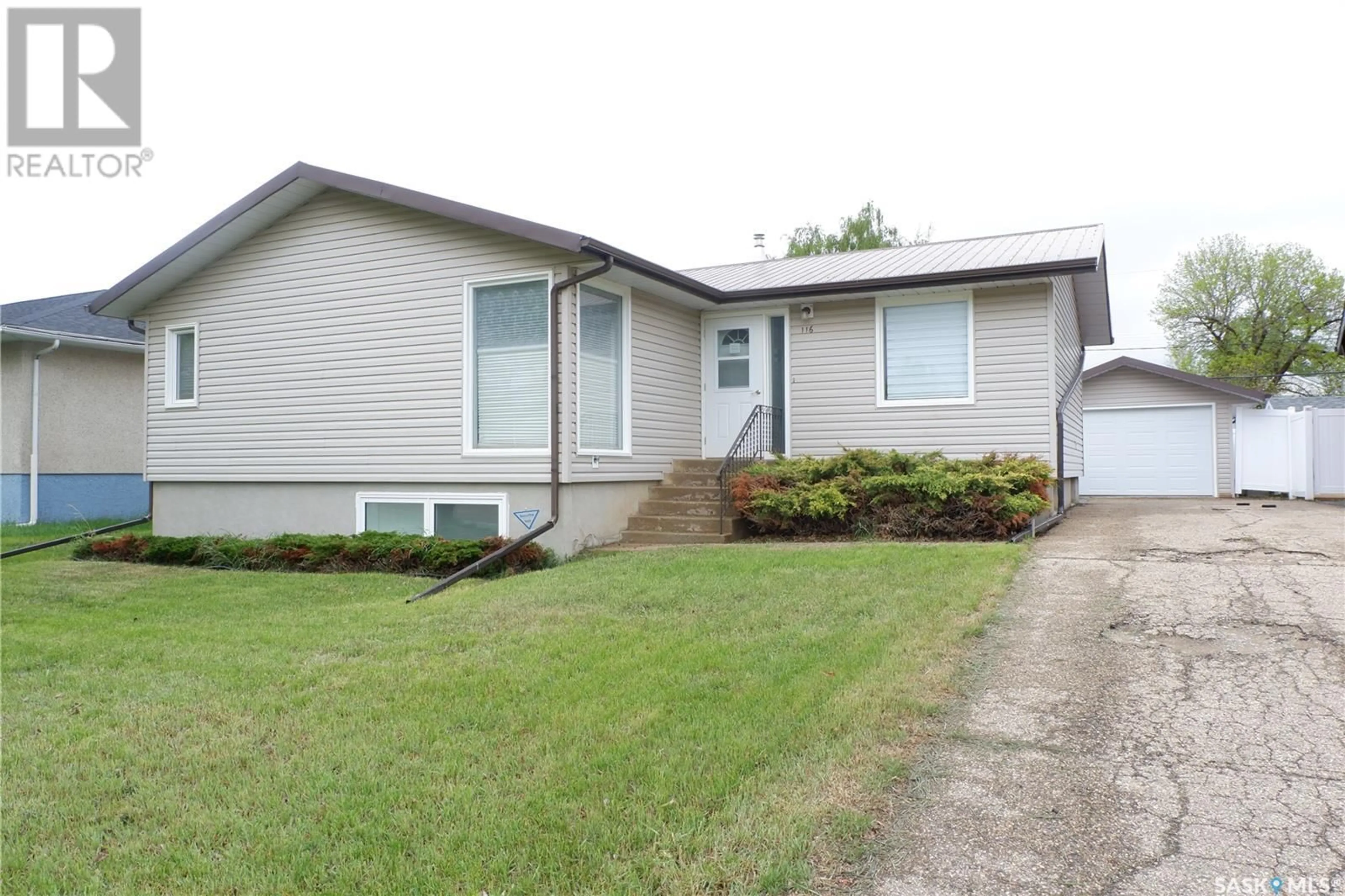 Home with vinyl exterior material, street for 116 EMPIRE PLACE, Assiniboia Saskatchewan S0H0B0