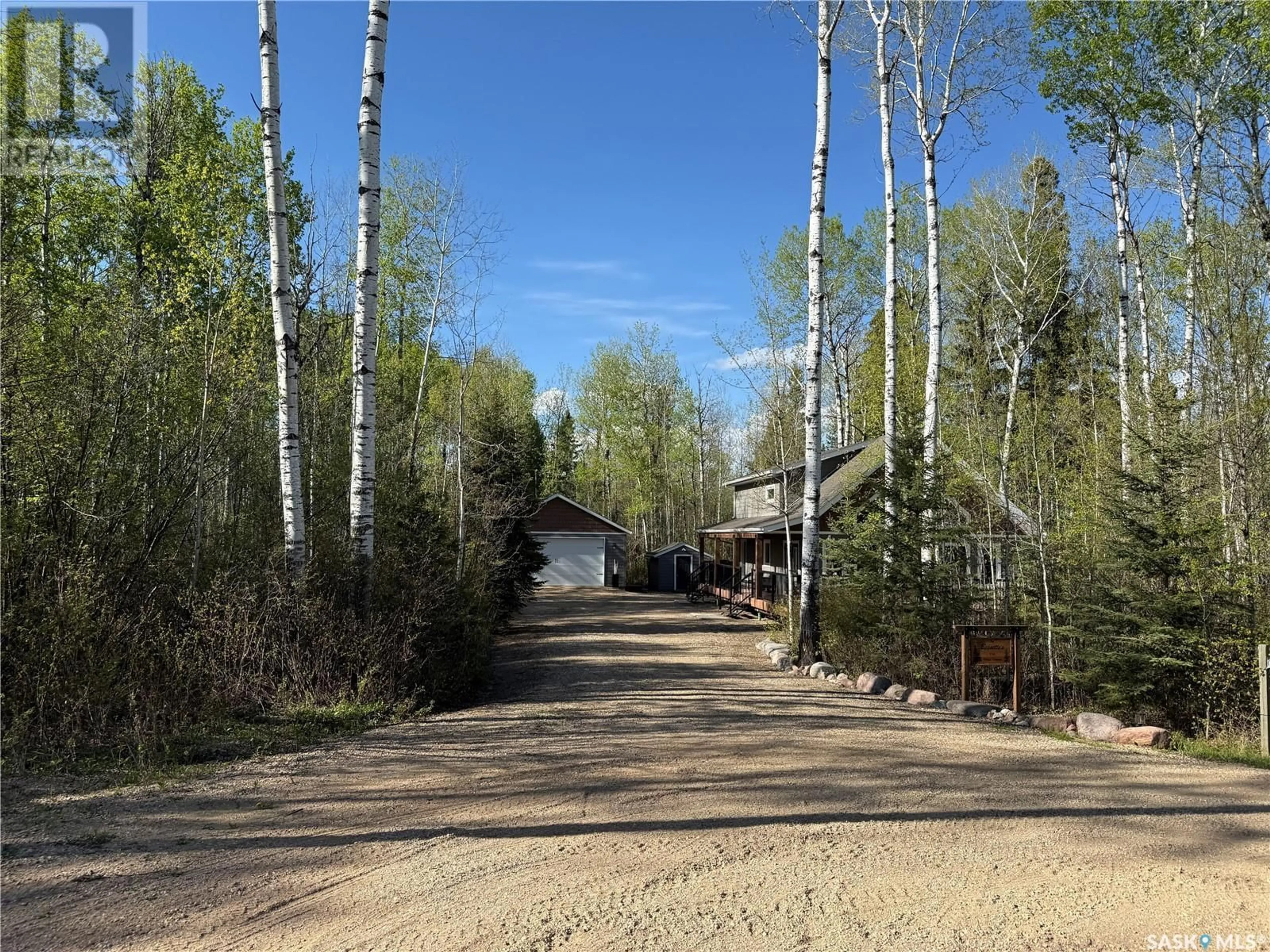 A pic from outside/outdoor area/front of a property/back of a property/a pic from drone, forest/trees view for 114 PHILLIPS CRESCENT, Phillips Grove Saskatchewan S0J0E0