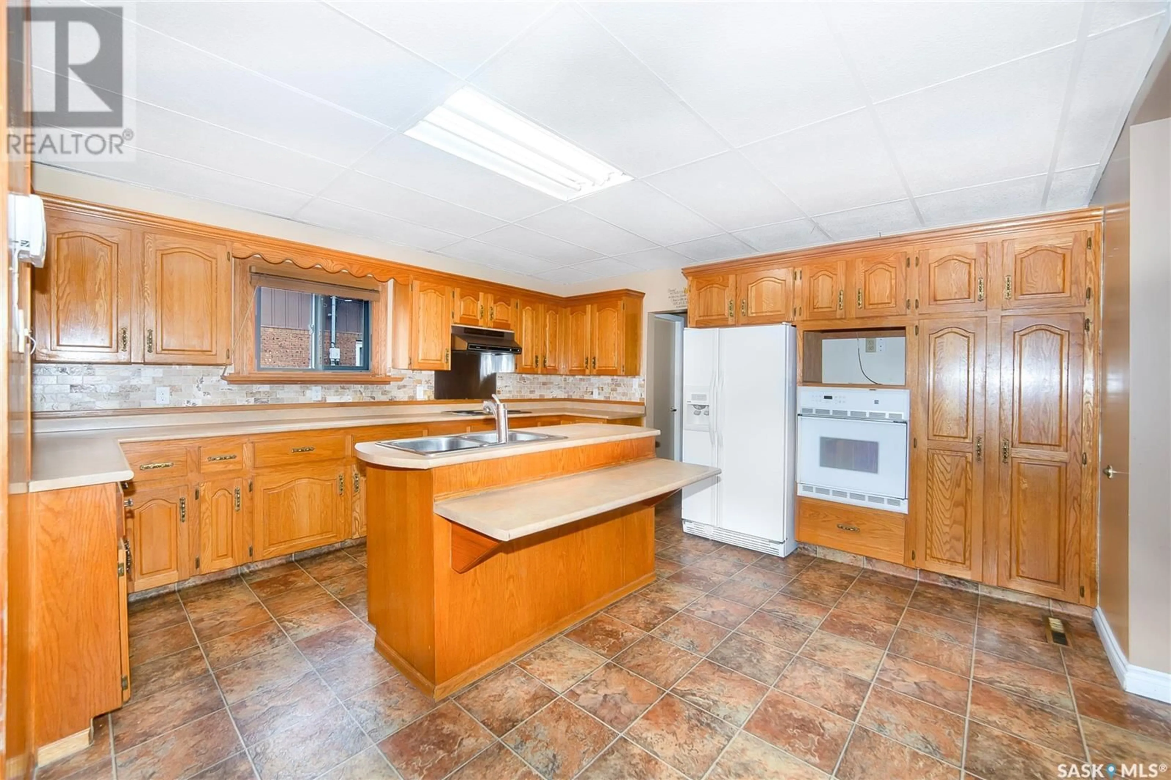 Standard kitchen, ceramic/tile floor for 204 5TH AVENUE, Aberdeen Saskatchewan S0K0A0