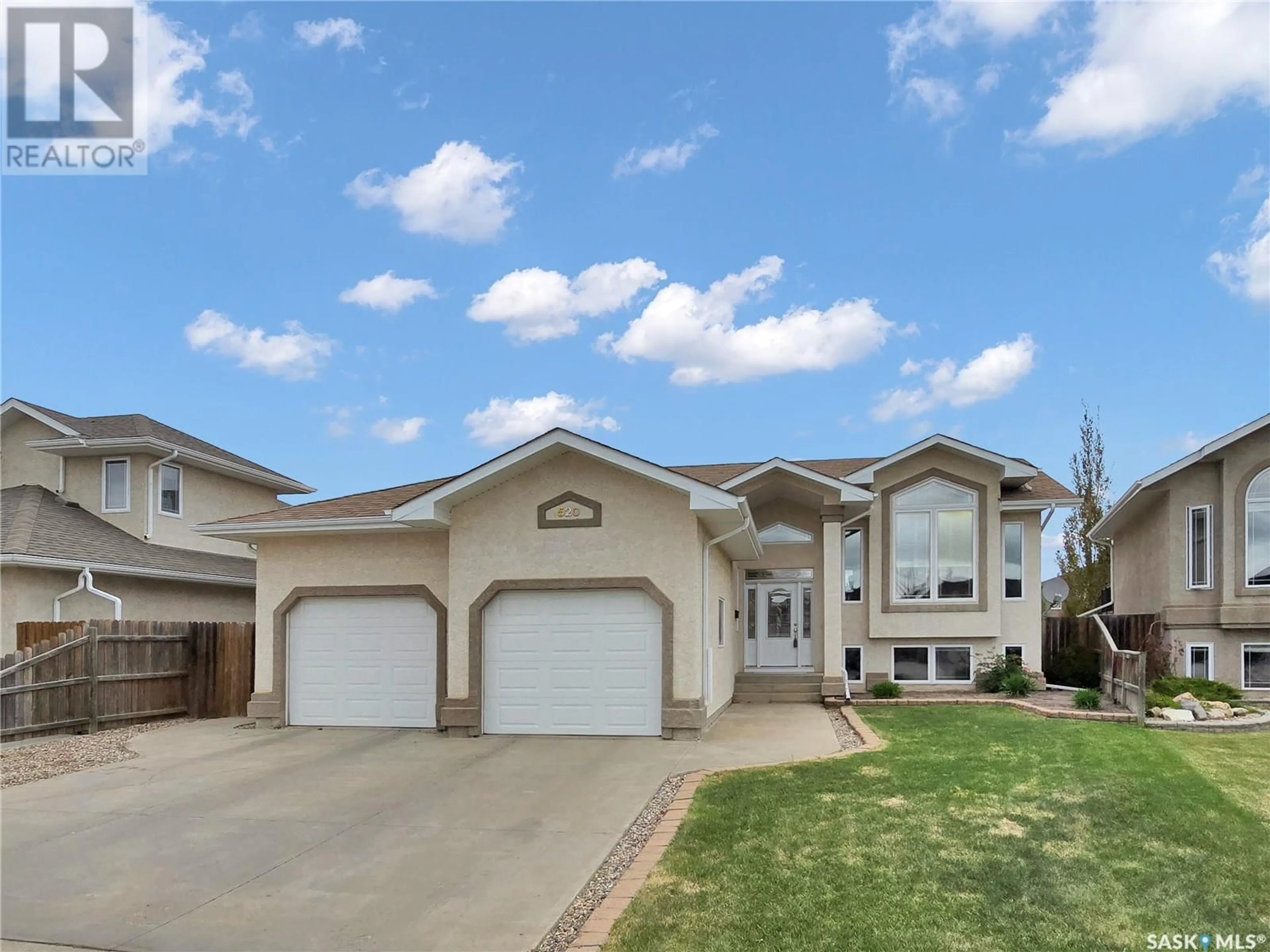 Home with vinyl exterior material, street for 520 ENS LANE, Warman Saskatchewan S0K4S0
