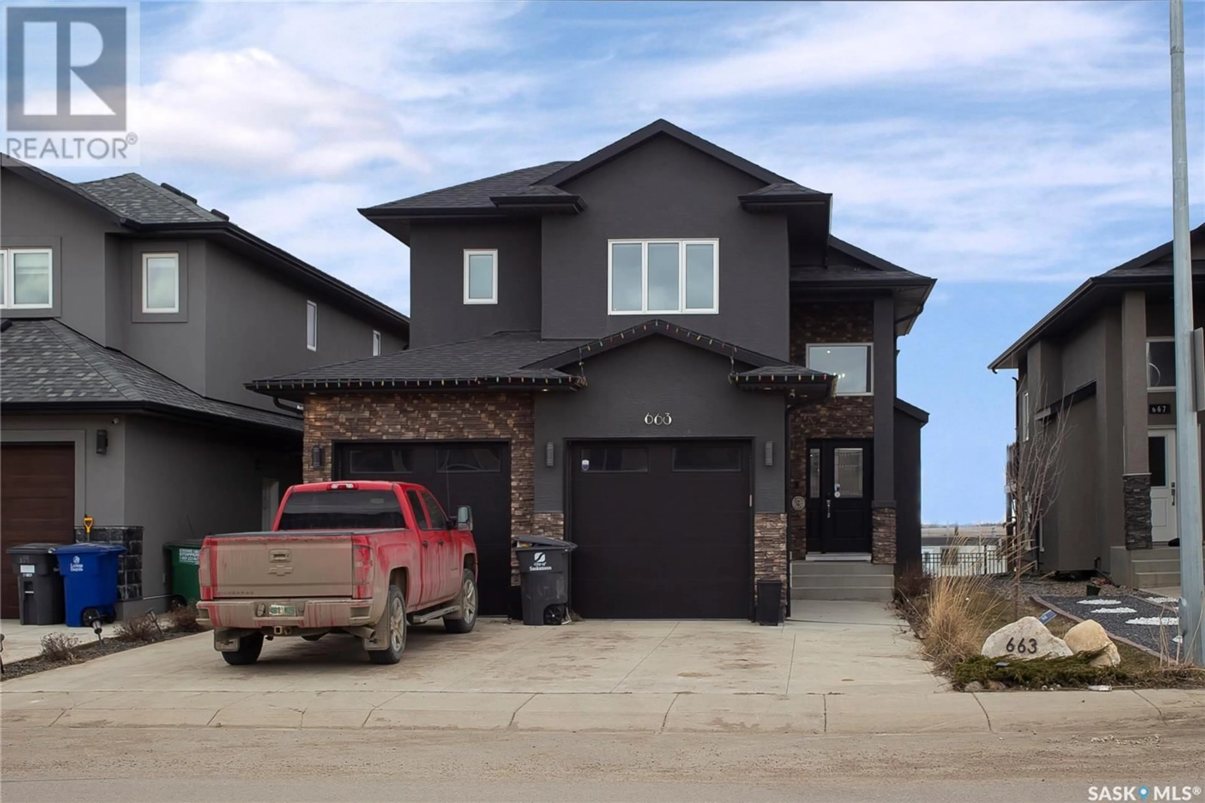 Home with brick exterior material, street for 663 KENASCHUK CRESCENT, Saskatoon Saskatchewan S7W0Y4