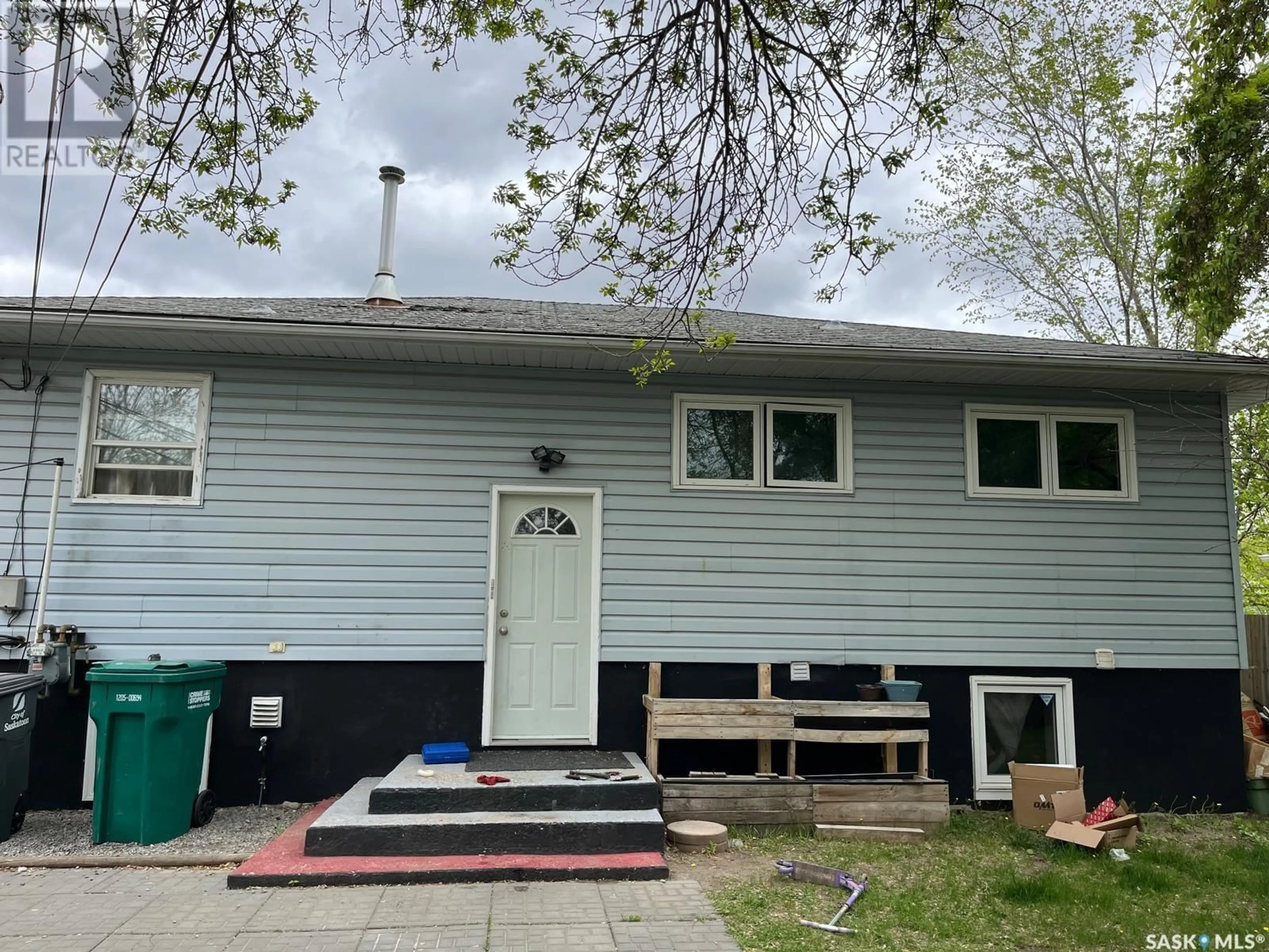 Home with vinyl exterior material, street for 237 WITNEY AVENUE, Saskatoon Saskatchewan S7L3M2