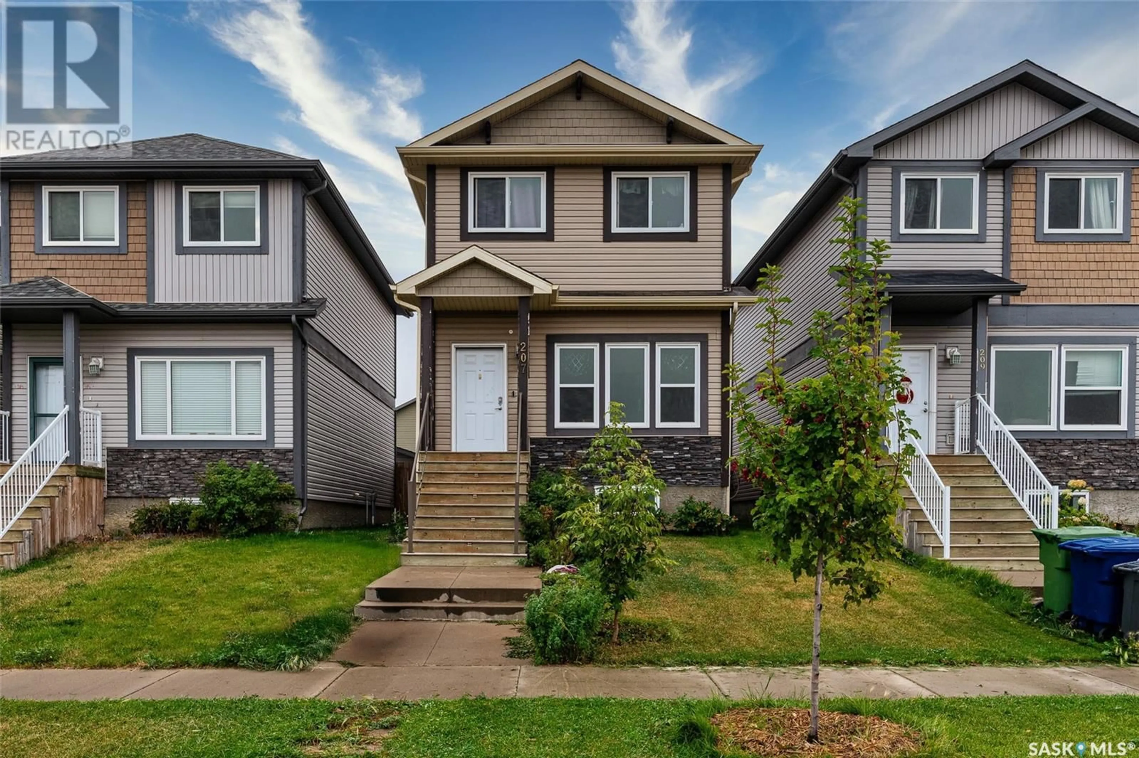 Home with vinyl exterior material, street for N - 207 ROSEWOOD GATE, Saskatoon Saskatchewan S7V0J2