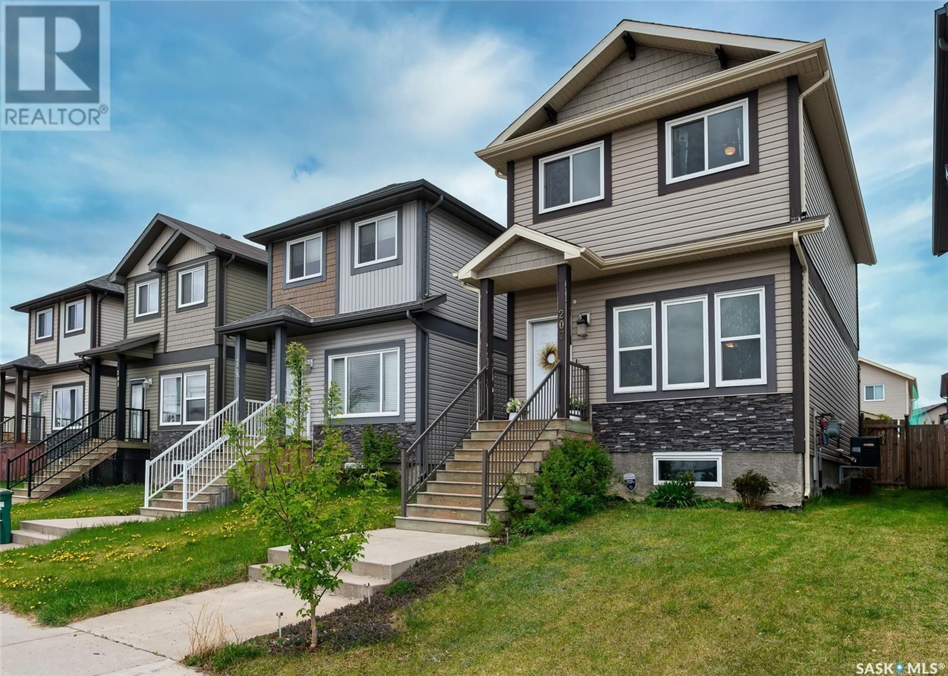 Home with vinyl exterior material, street for N - 207 ROSEWOOD GATE, Saskatoon Saskatchewan S7V0J2