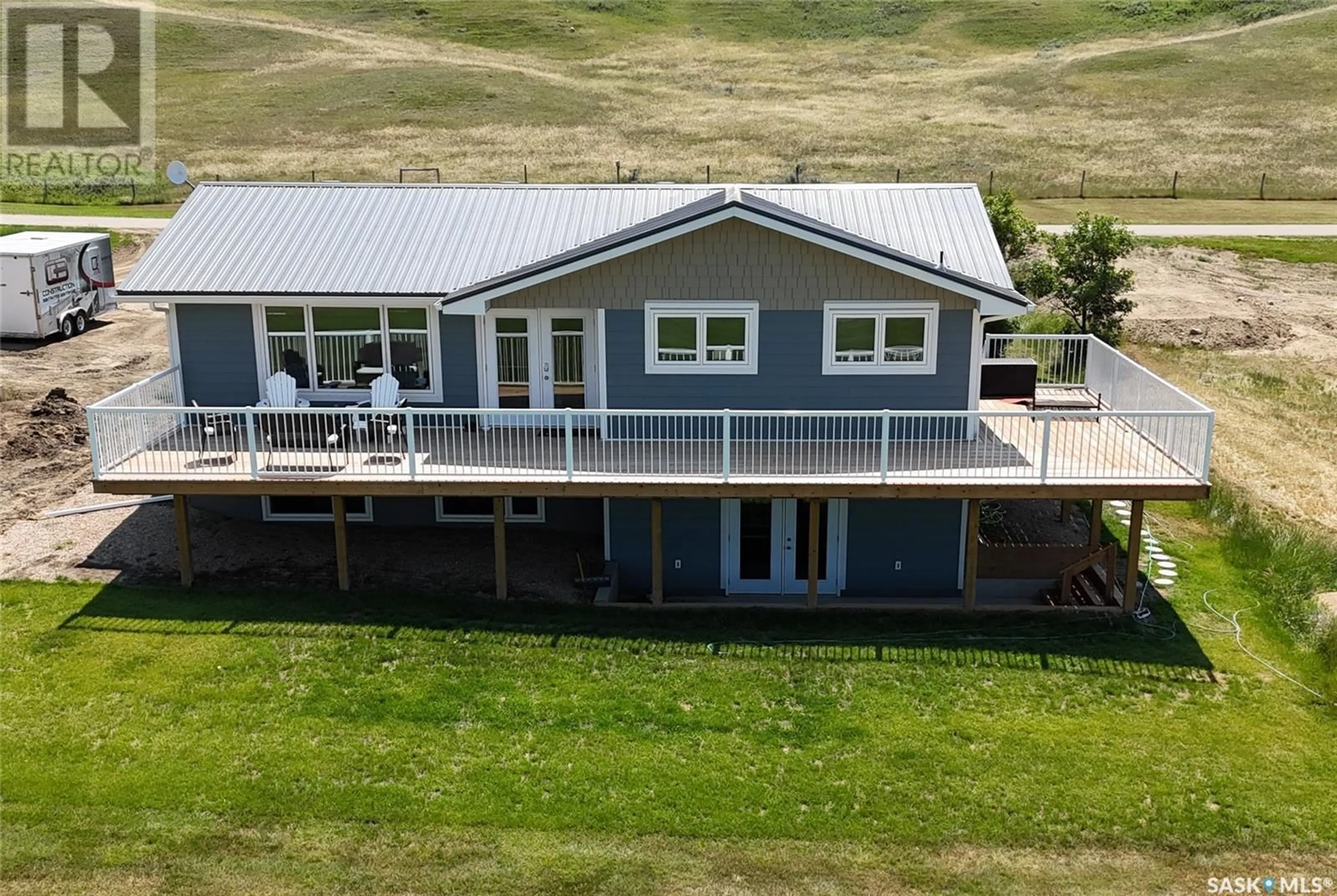 A pic from outside/outdoor area/front of a property/back of a property/a pic from drone, water/lake/river/ocean view for 116 STEELE STREET, Beaver Flat Saskatchewan S9H3X1