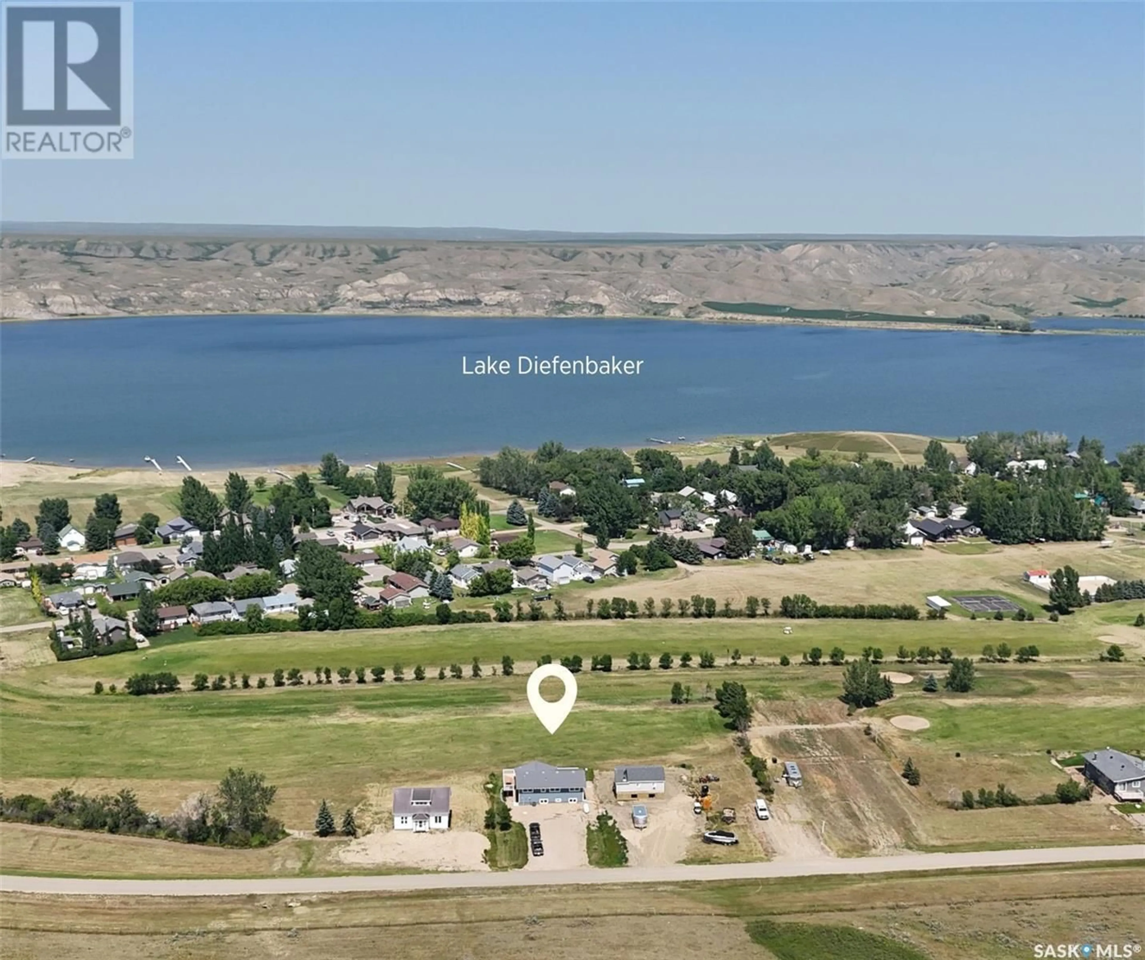 A pic from outside/outdoor area/front of a property/back of a property/a pic from drone, water/lake/river/ocean view for 116 STEELE STREET, Beaver Flat Saskatchewan S9H3X1
