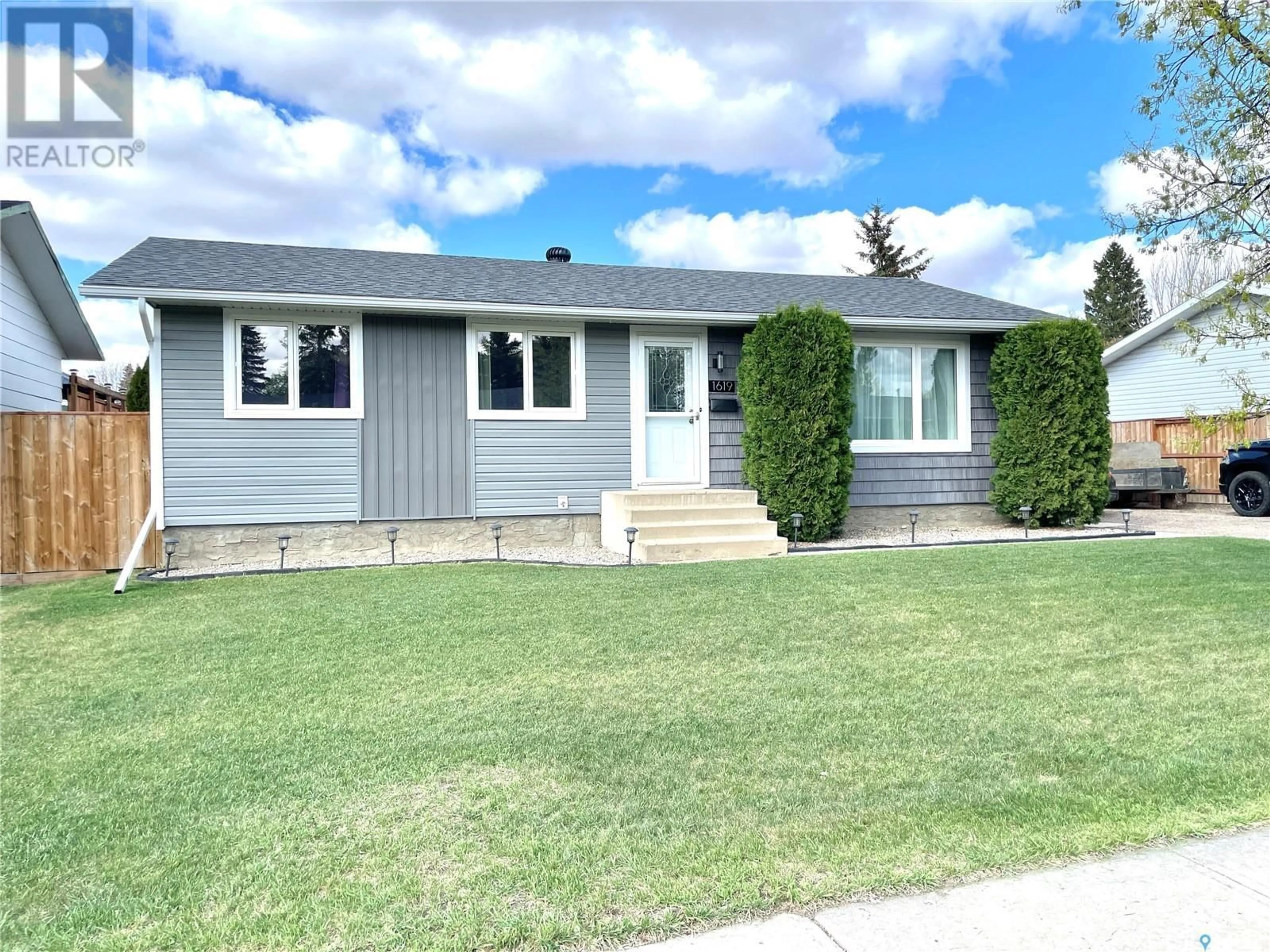 Home with vinyl exterior material, street for 1619 MACKENZIE KING CRESCENT, North Battleford Saskatchewan S9A3C9