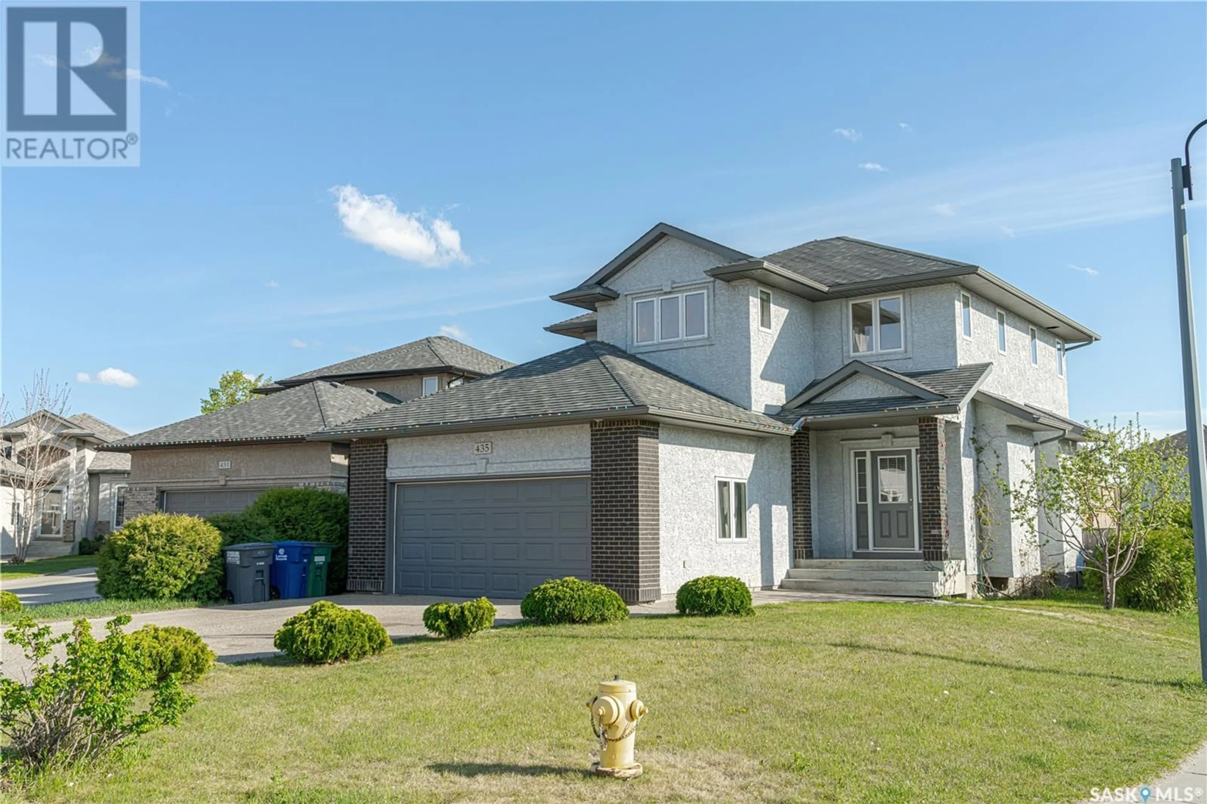 Home with brick exterior material, street for 435 MCINTOSH COURT, Saskatoon Saskatchewan S7T0C4