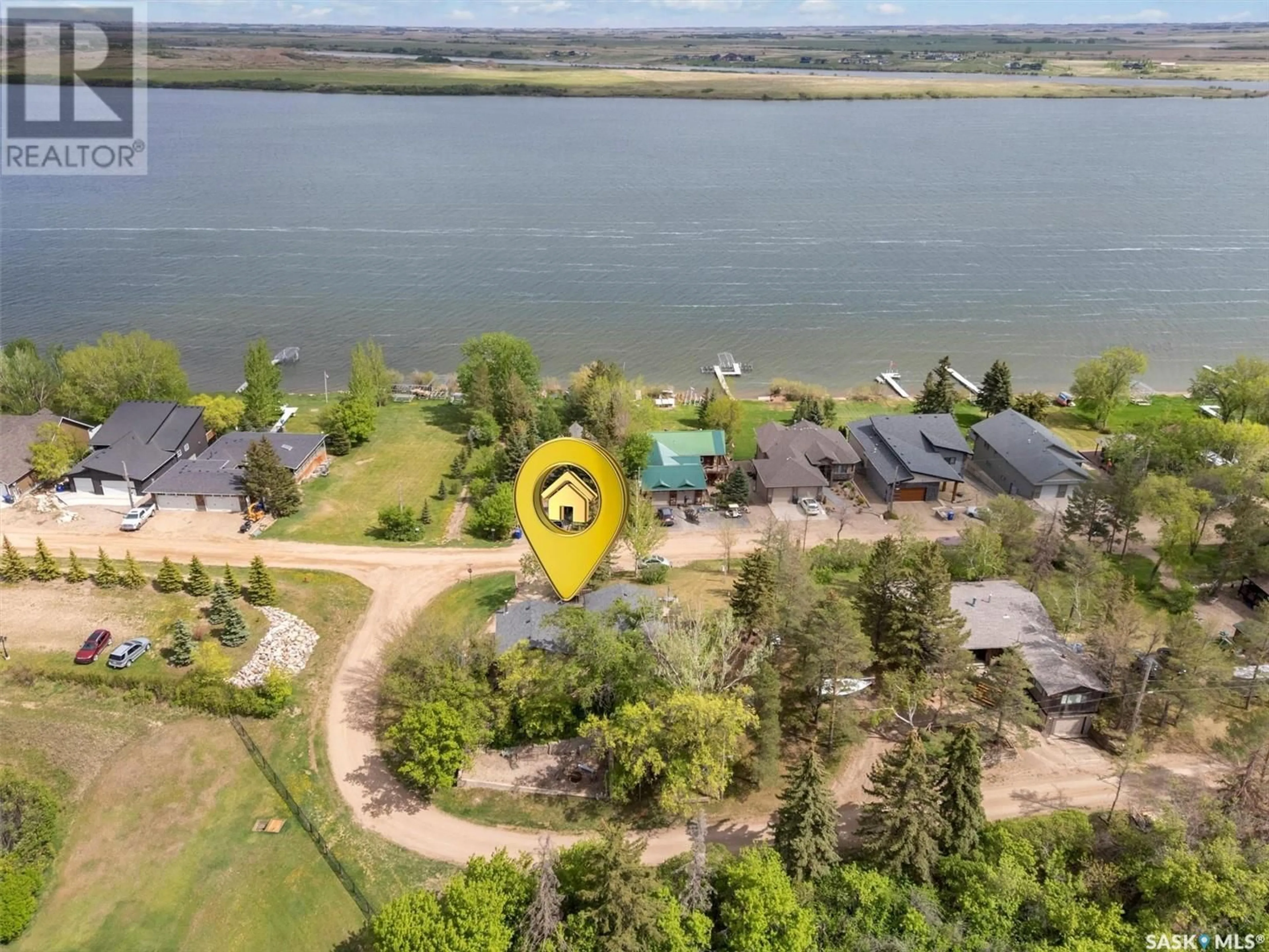 A pic from outside/outdoor area/front of a property/back of a property/a pic from drone, water/lake/river/ocean view for 18 PROCTOR DRIVE, Shields Saskatchewan S0K1K0