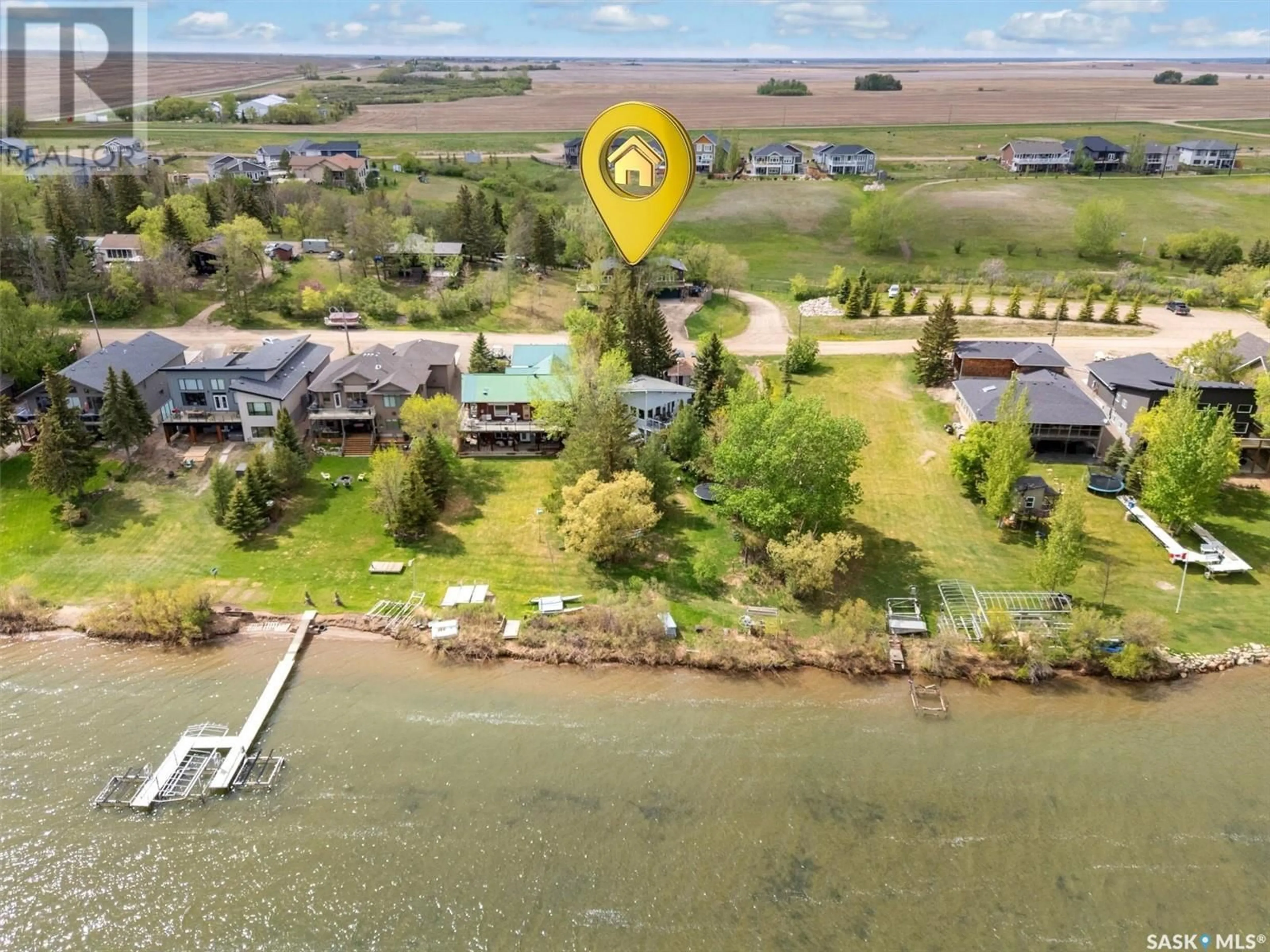 A pic from outside/outdoor area/front of a property/back of a property/a pic from drone, water/lake/river/ocean view for 18 PROCTOR DRIVE, Shields Saskatchewan S0K1K0