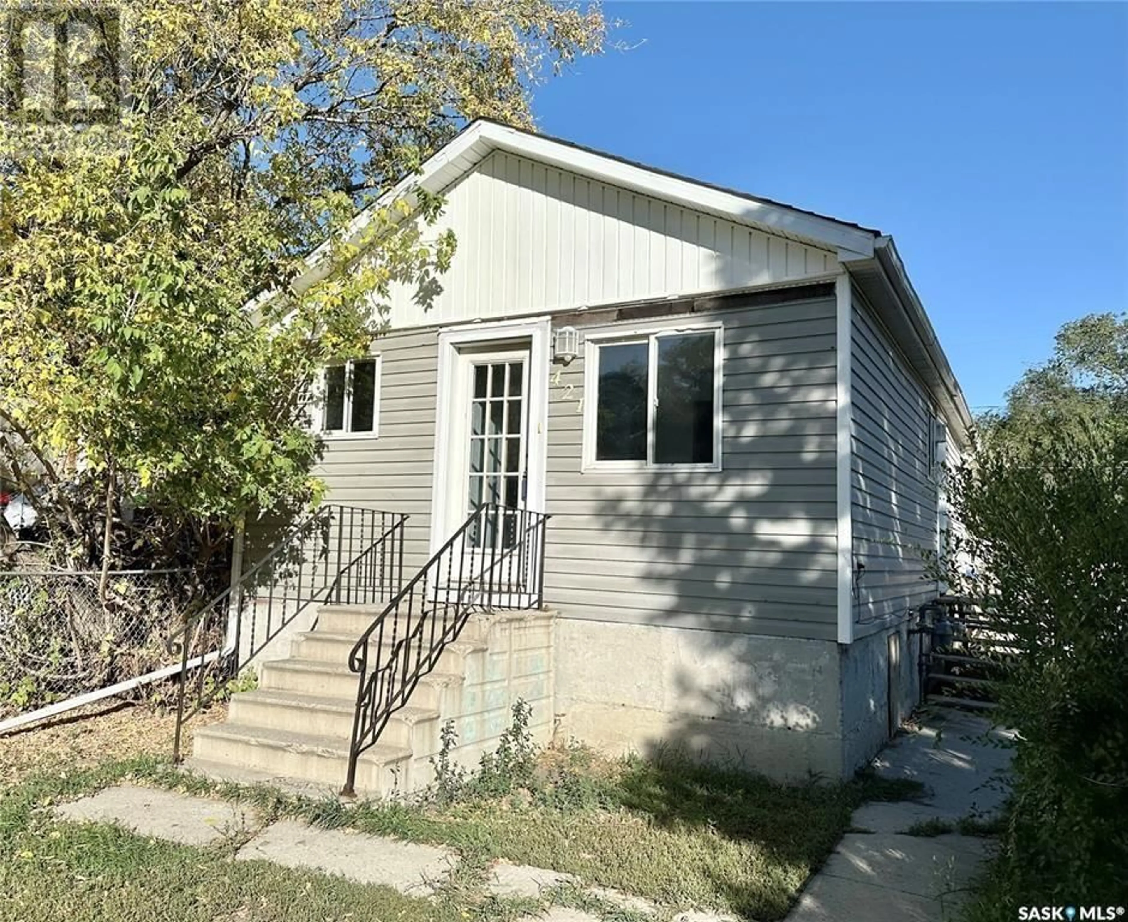 Home with vinyl exterior material, street for 421 ALEXANDRA STREET, Regina Saskatchewan S4R4W6
