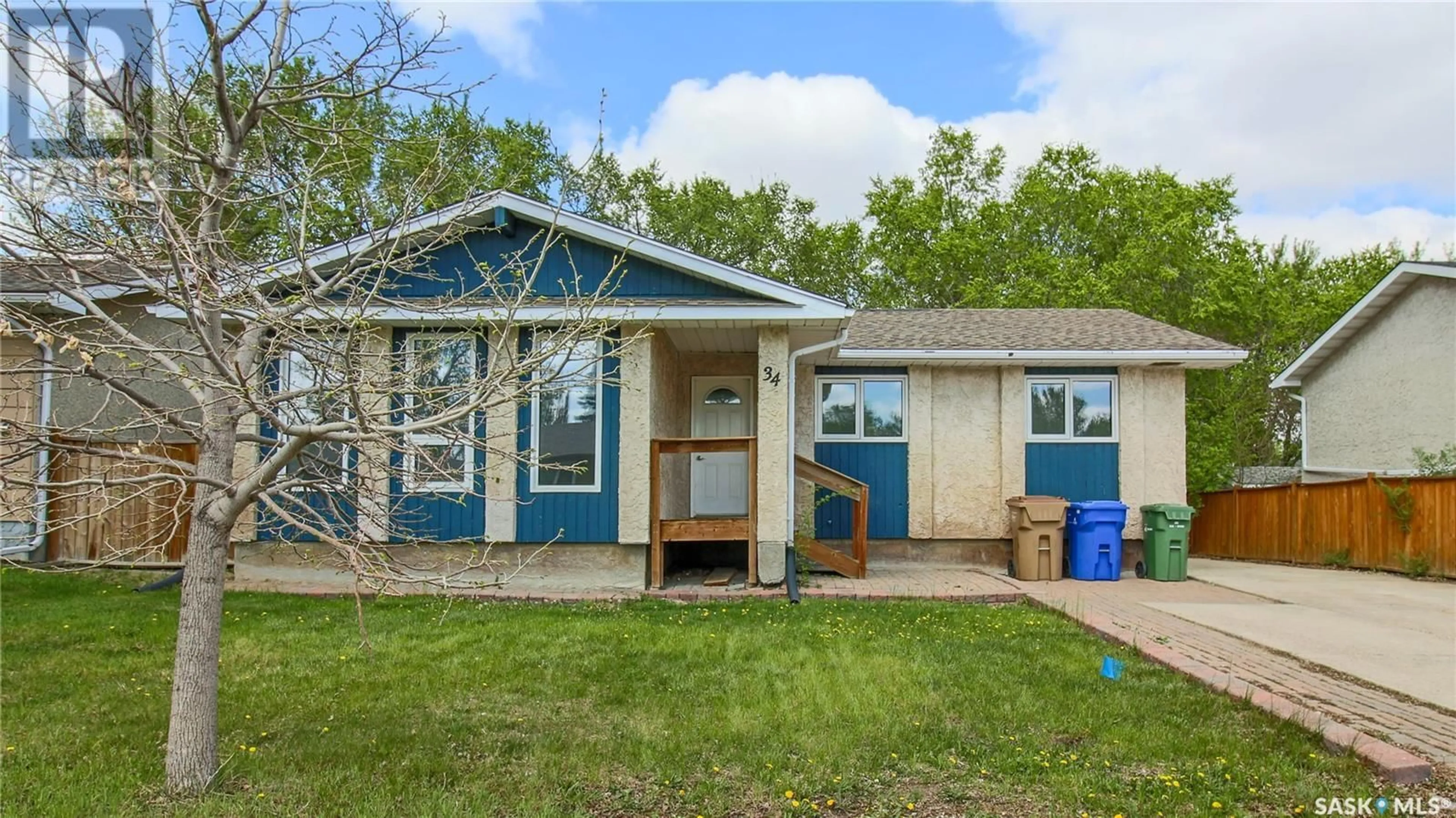 Home with vinyl exterior material, street for 34 HATTON CRESCENT, Regina Saskatchewan S4N5K6