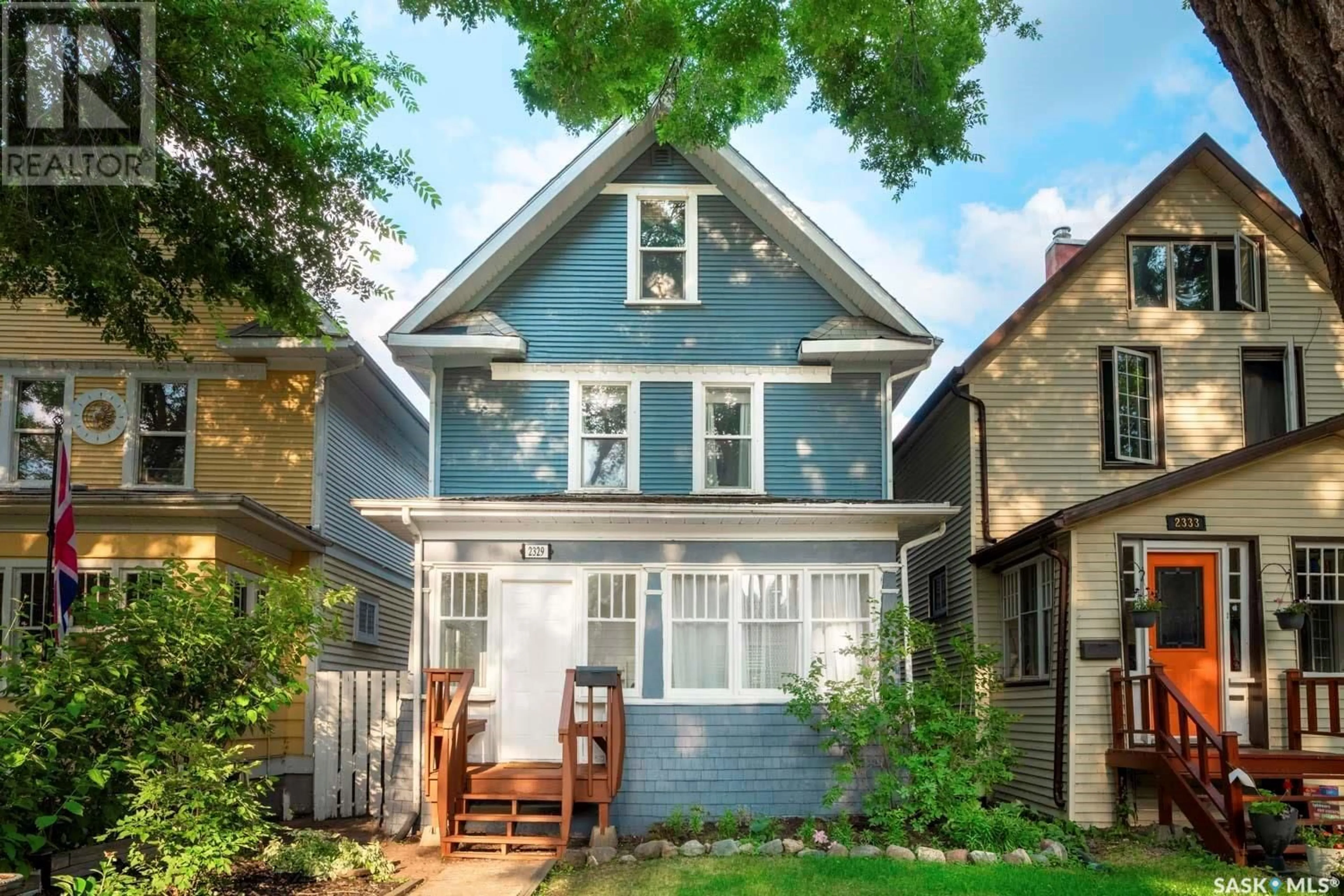 Home with vinyl exterior material, street for 2329 MONTREAL STREET, Regina Saskatchewan S4P1L9