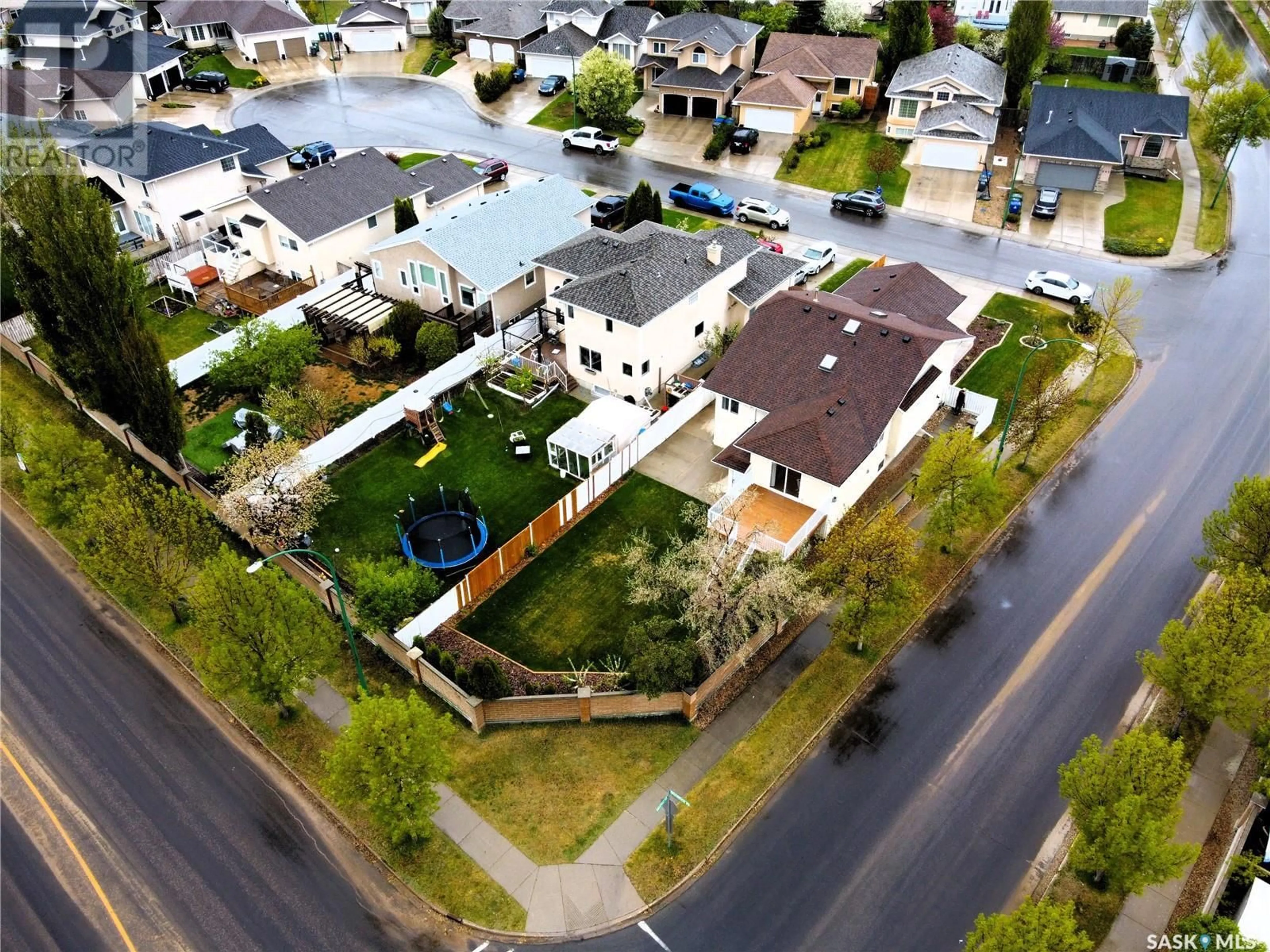 A pic from outside/outdoor area/front of a property/back of a property/a pic from drone, street for 663 BRIARVALE TERRACE, Saskatoon Saskatchewan S7V1B9