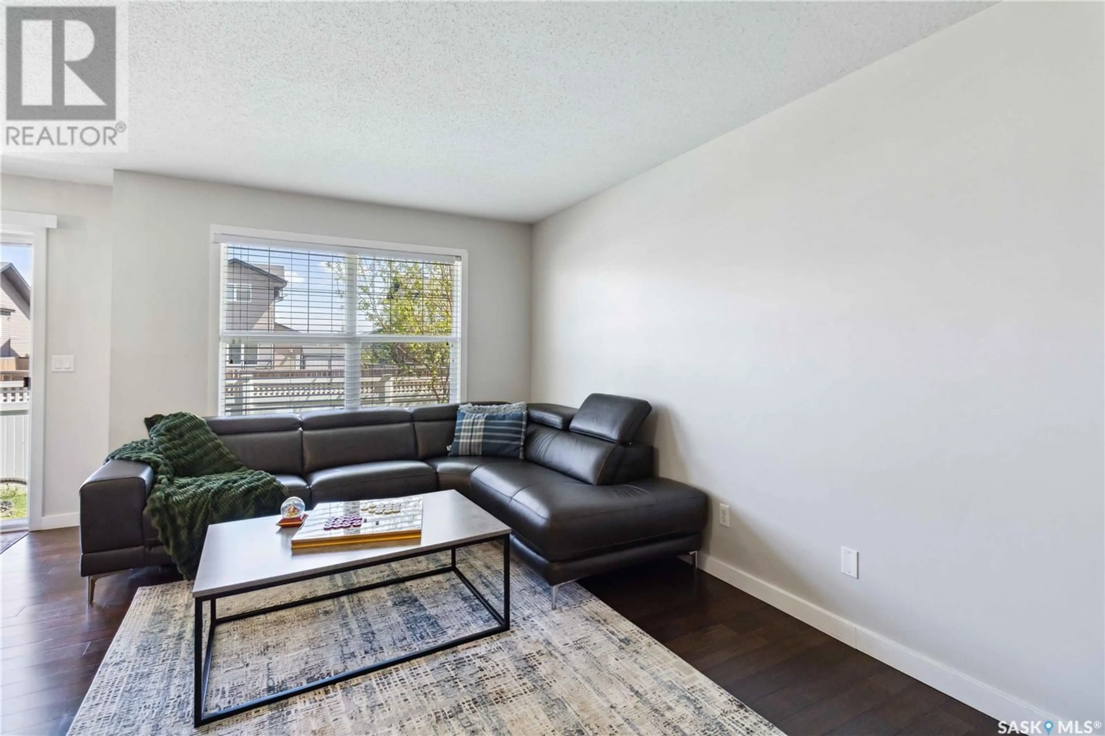 Living room with furniture, unknown for 410 - 312 LEDINGHAM WAY, Saskatoon Saskatchewan S7V0C4