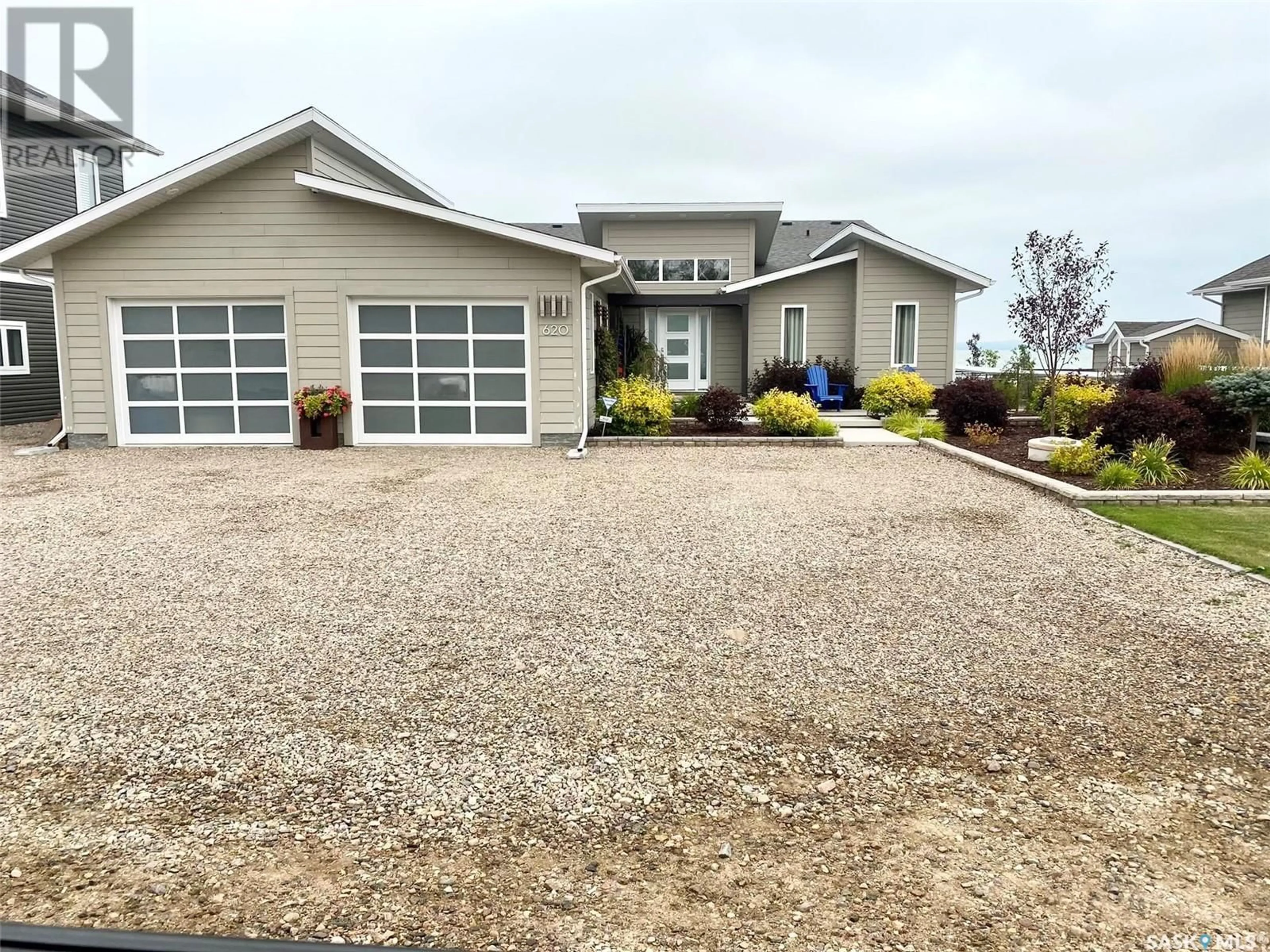 A pic from outside/outdoor area/front of a property/back of a property/a pic from drone, street for 620 LAKESHORE DRIVE, Meota Saskatchewan S0M1X0
