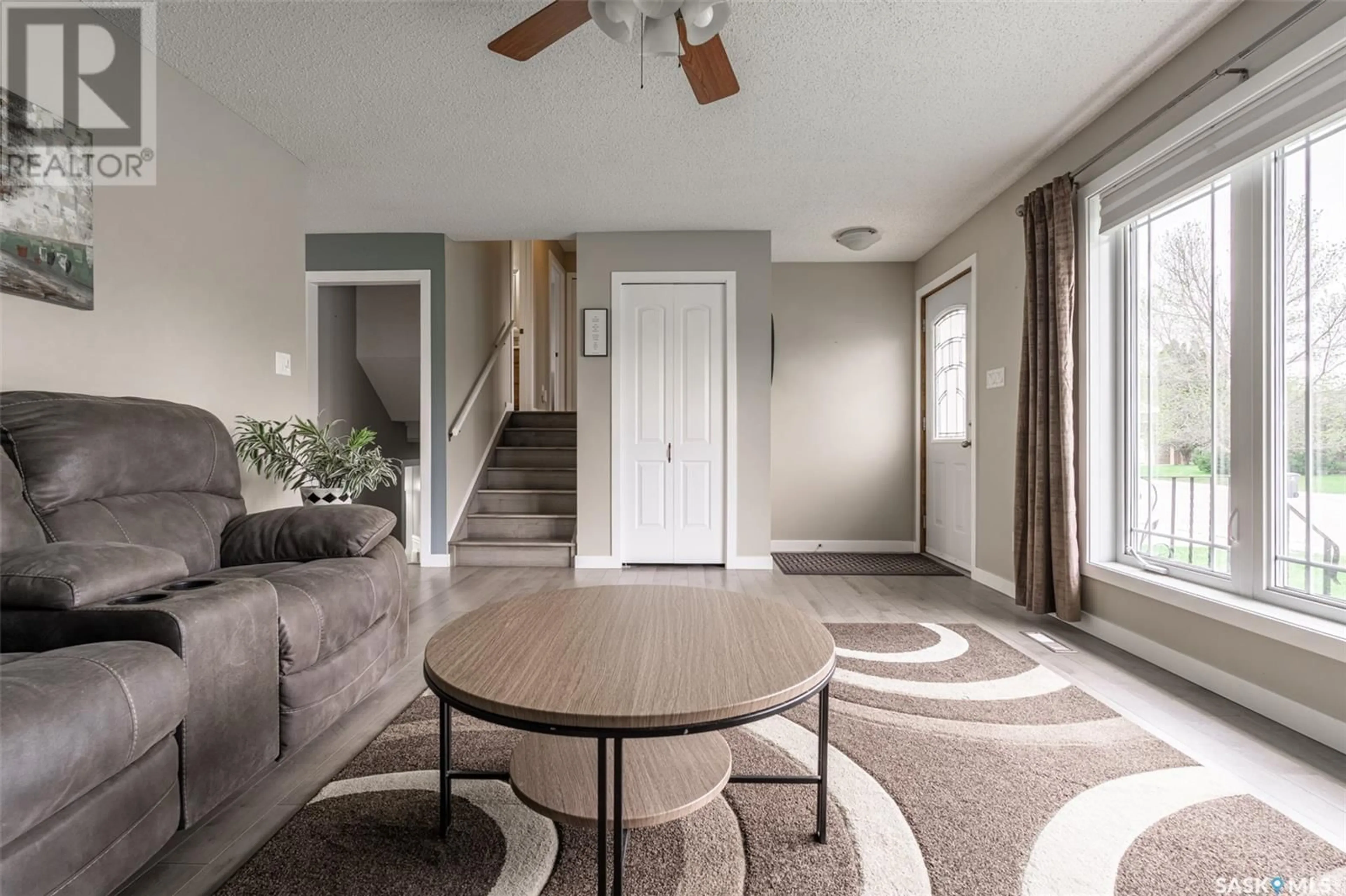 Living room with furniture, unknown for 110 ALLEGRETTO CRESCENT, Saskatoon Saskatchewan S7K6R5