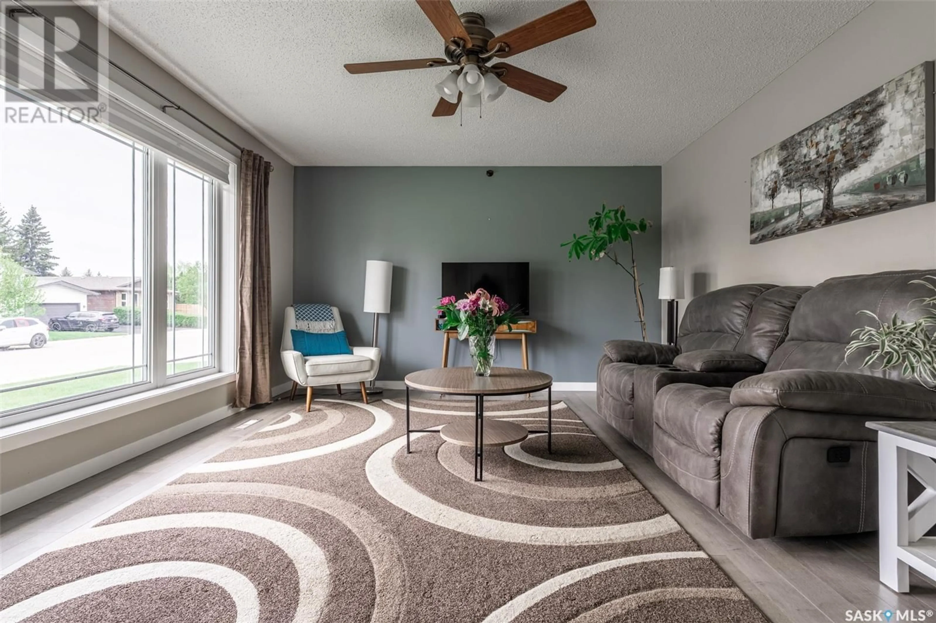 Living room with furniture, carpet floor for 110 ALLEGRETTO CRESCENT, Saskatoon Saskatchewan S7K6R5