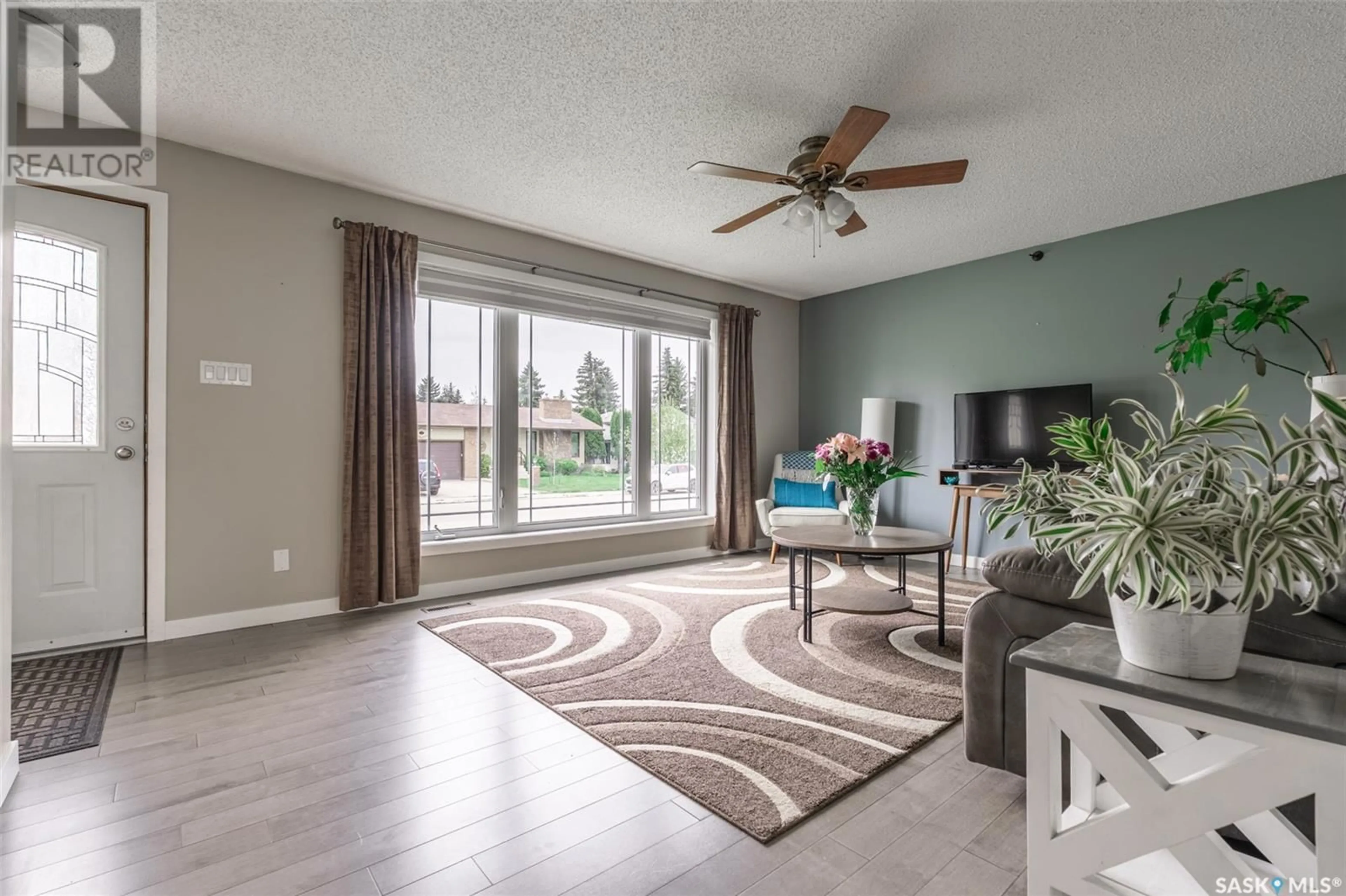 Living room with furniture, unknown for 110 ALLEGRETTO CRESCENT, Saskatoon Saskatchewan S7K6R5