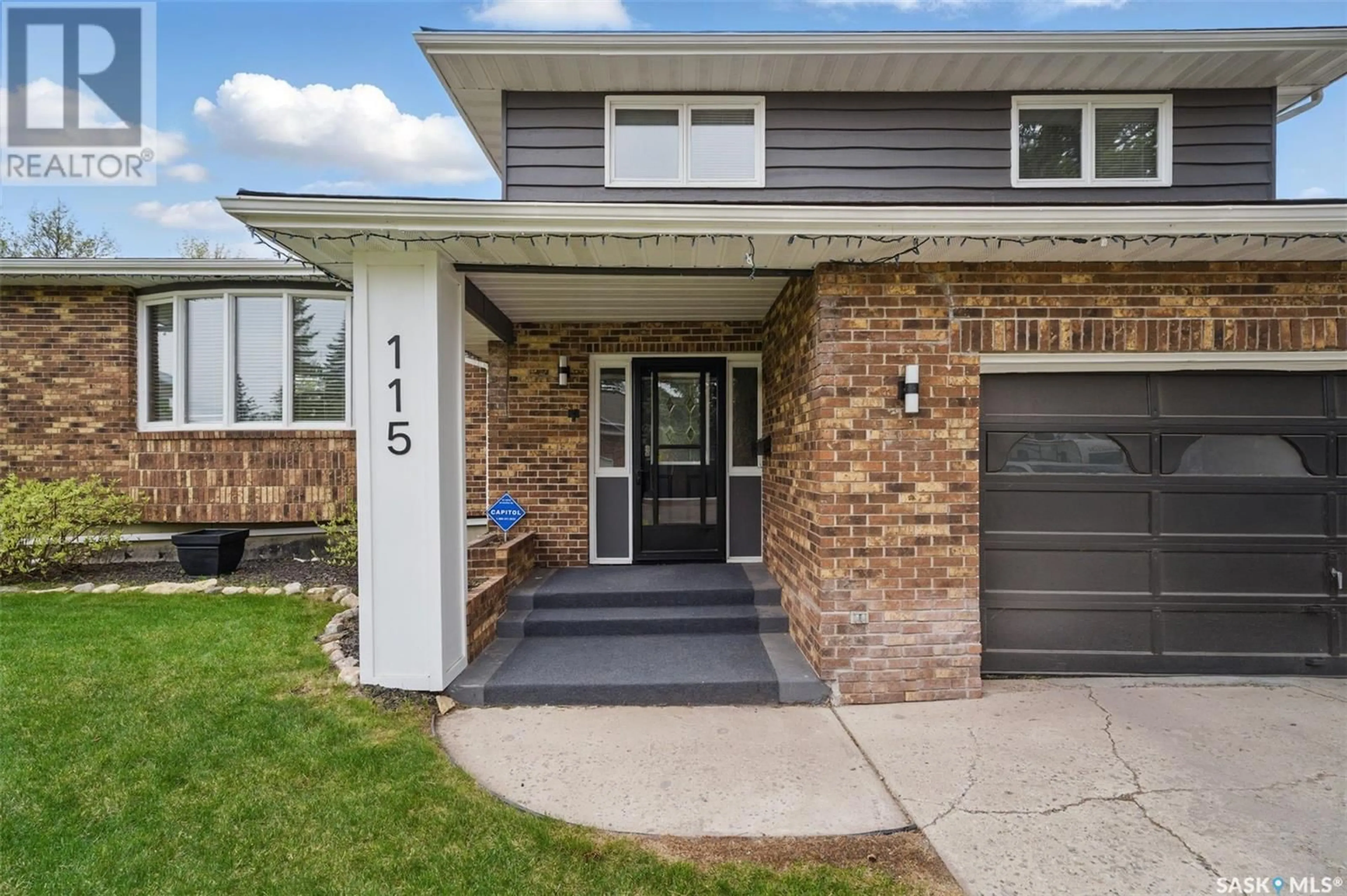 Home with brick exterior material, street for 115 AULD CRESCENT, Saskatoon Saskatchewan S7H4W8