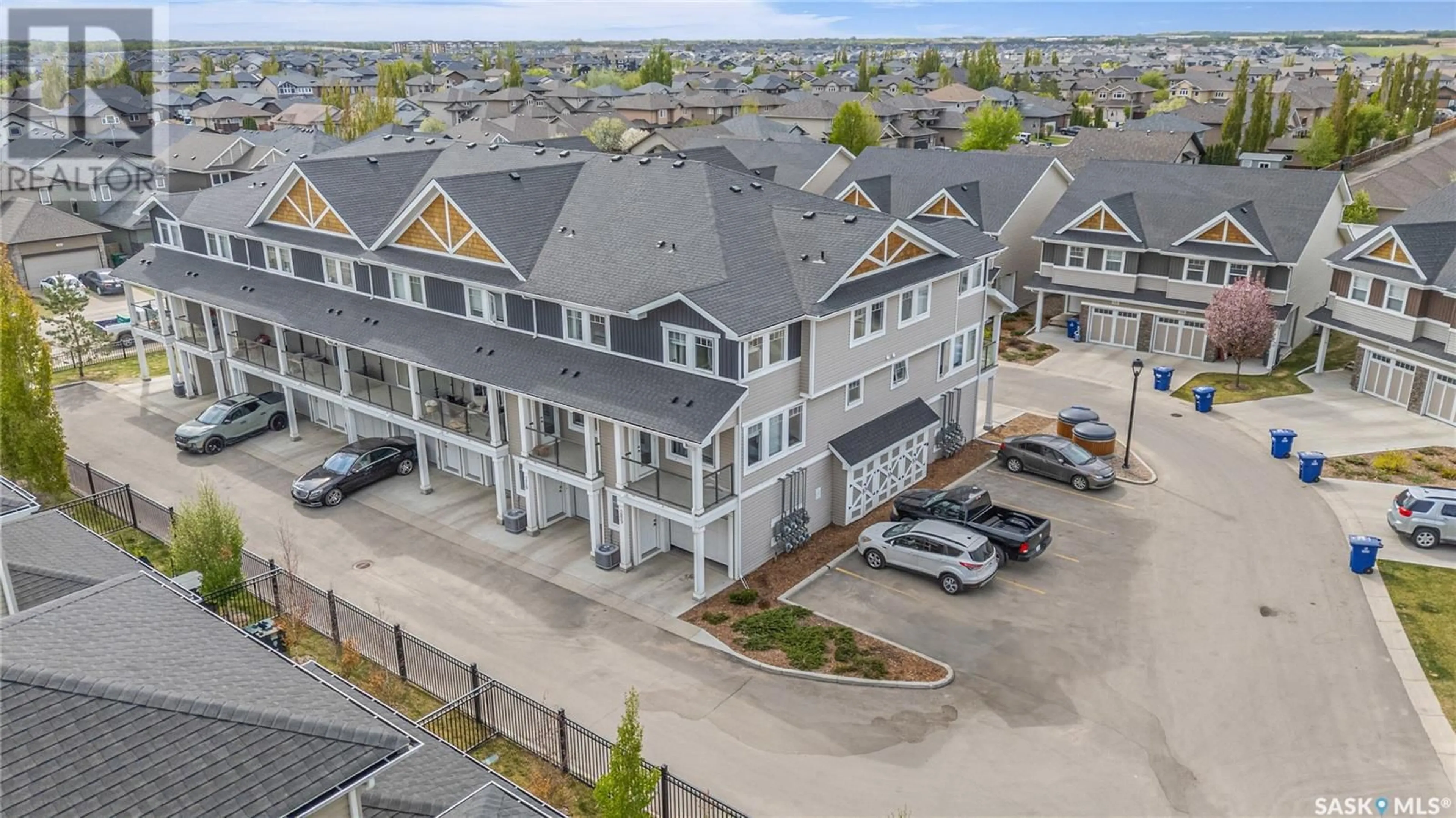 A pic from outside/outdoor area/front of a property/back of a property/a pic from drone, unknown for 315 - 209 DICKSON CRESCENT, Saskatoon Saskatchewan S7T0T8