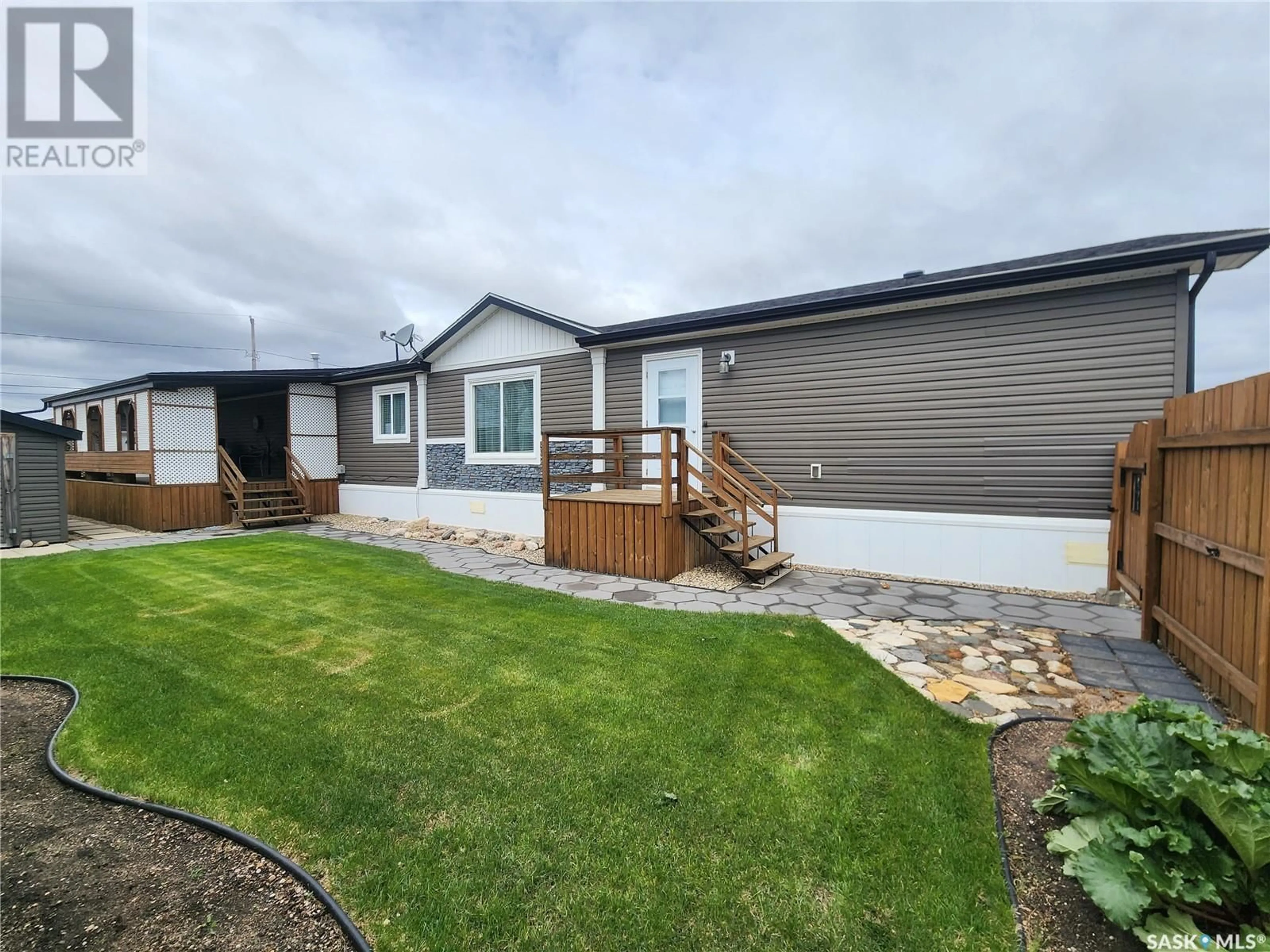 A pic from outside/outdoor area/front of a property/back of a property/a pic from drone, street for 167 WINNIPEG STREET, Melville Saskatchewan S0A2P0