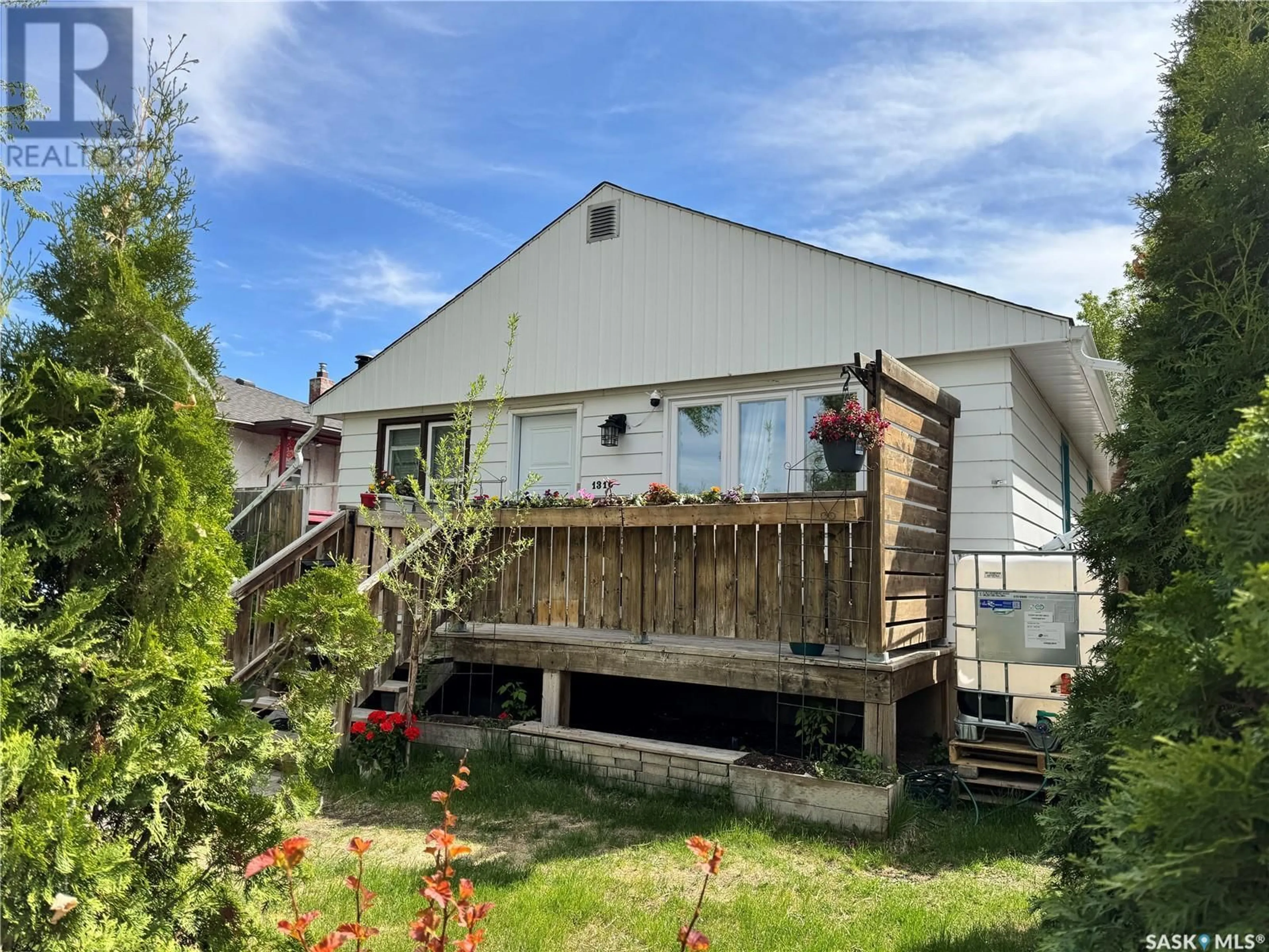 A pic from outside/outdoor area/front of a property/back of a property/a pic from drone, street for 1310 H AVENUE, Saskatoon Saskatchewan S7L2E4