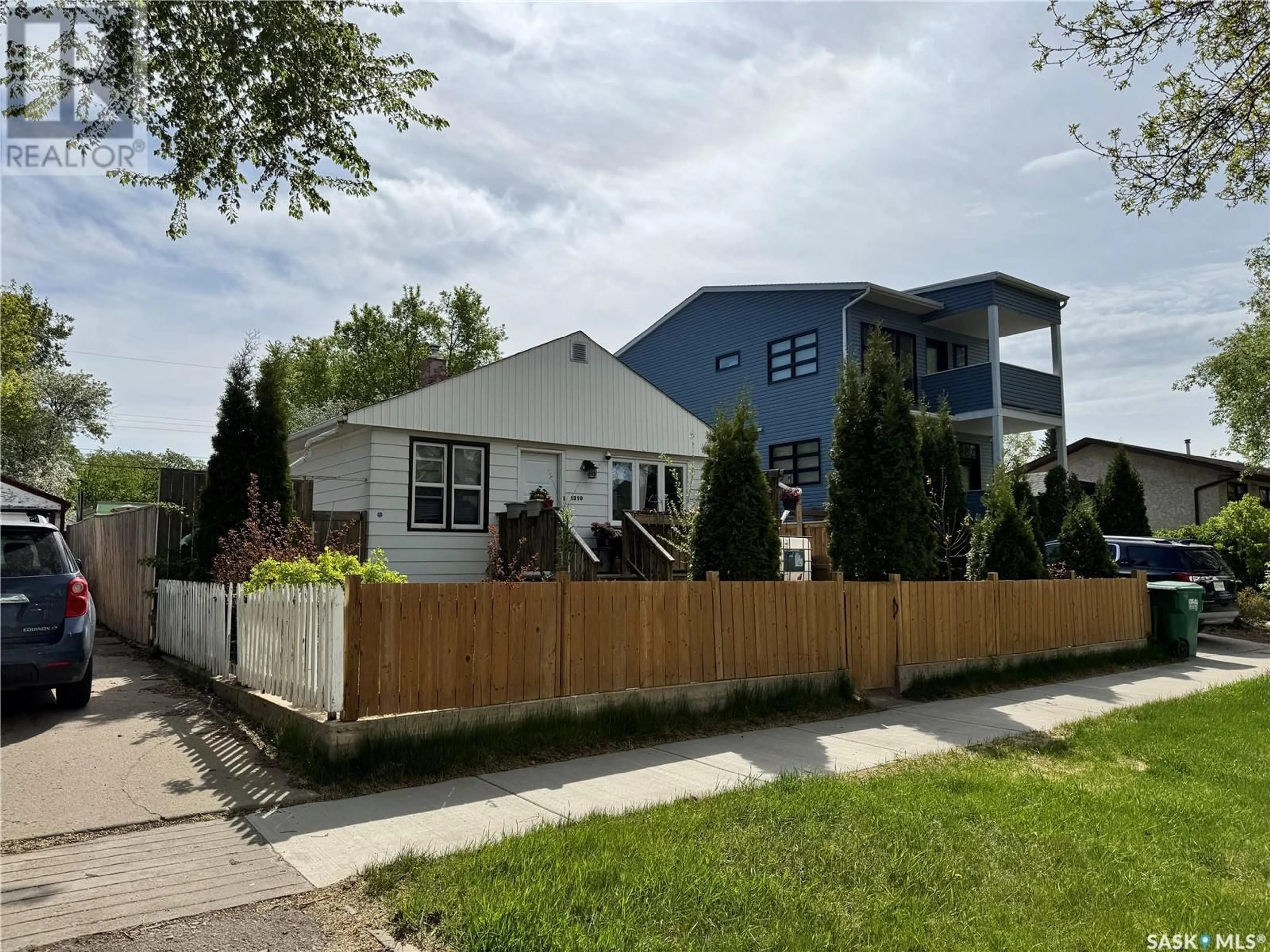 Home with vinyl exterior material, street for 1310 H AVENUE, Saskatoon Saskatchewan S7L2E4