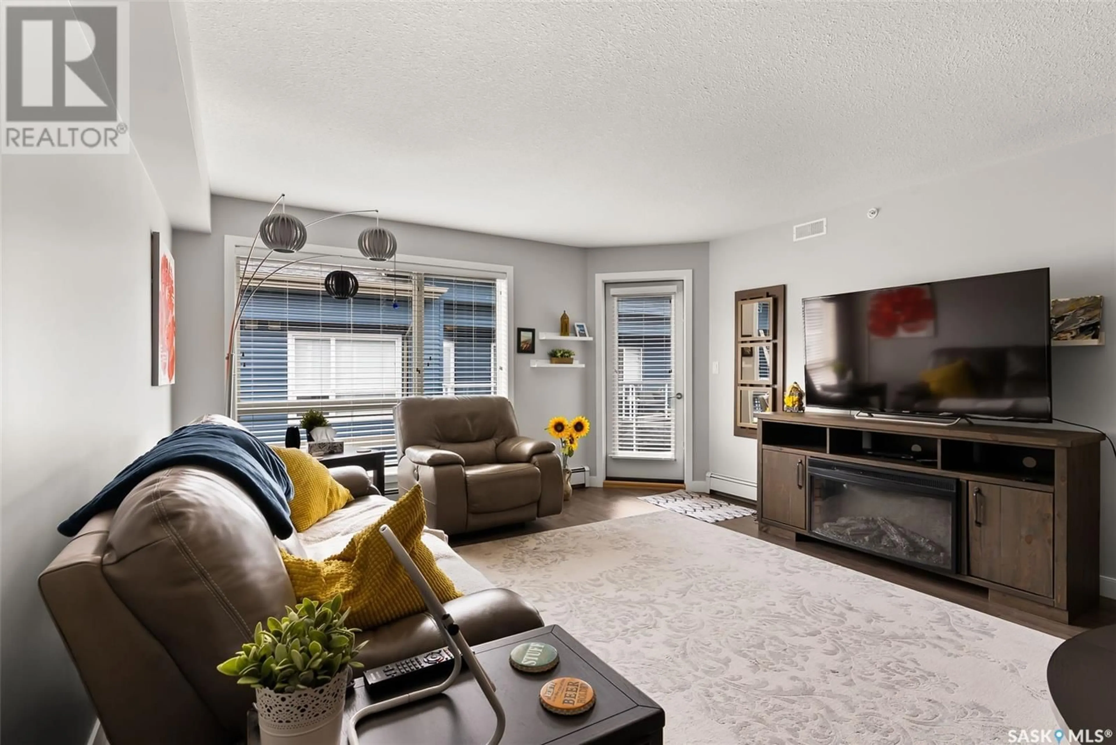 Living room with furniture, unknown for 307 - 2321 WINDSOR PARK ROAD, Regina Saskatchewan S4V3N2
