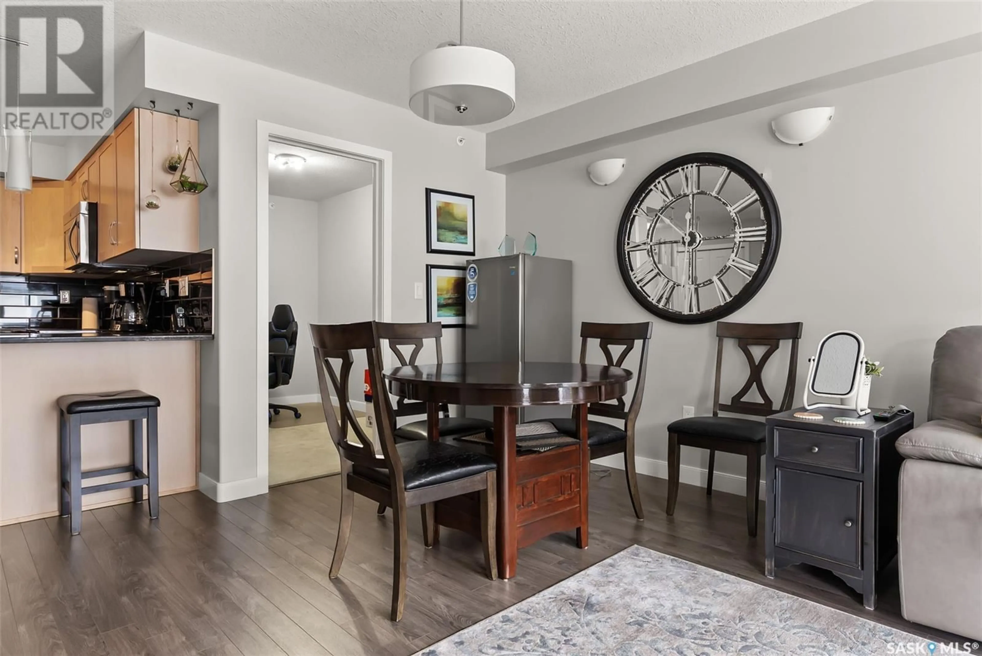 Dining room, wood/laminate floor for 307 - 2321 WINDSOR PARK ROAD, Regina Saskatchewan S4V3N2