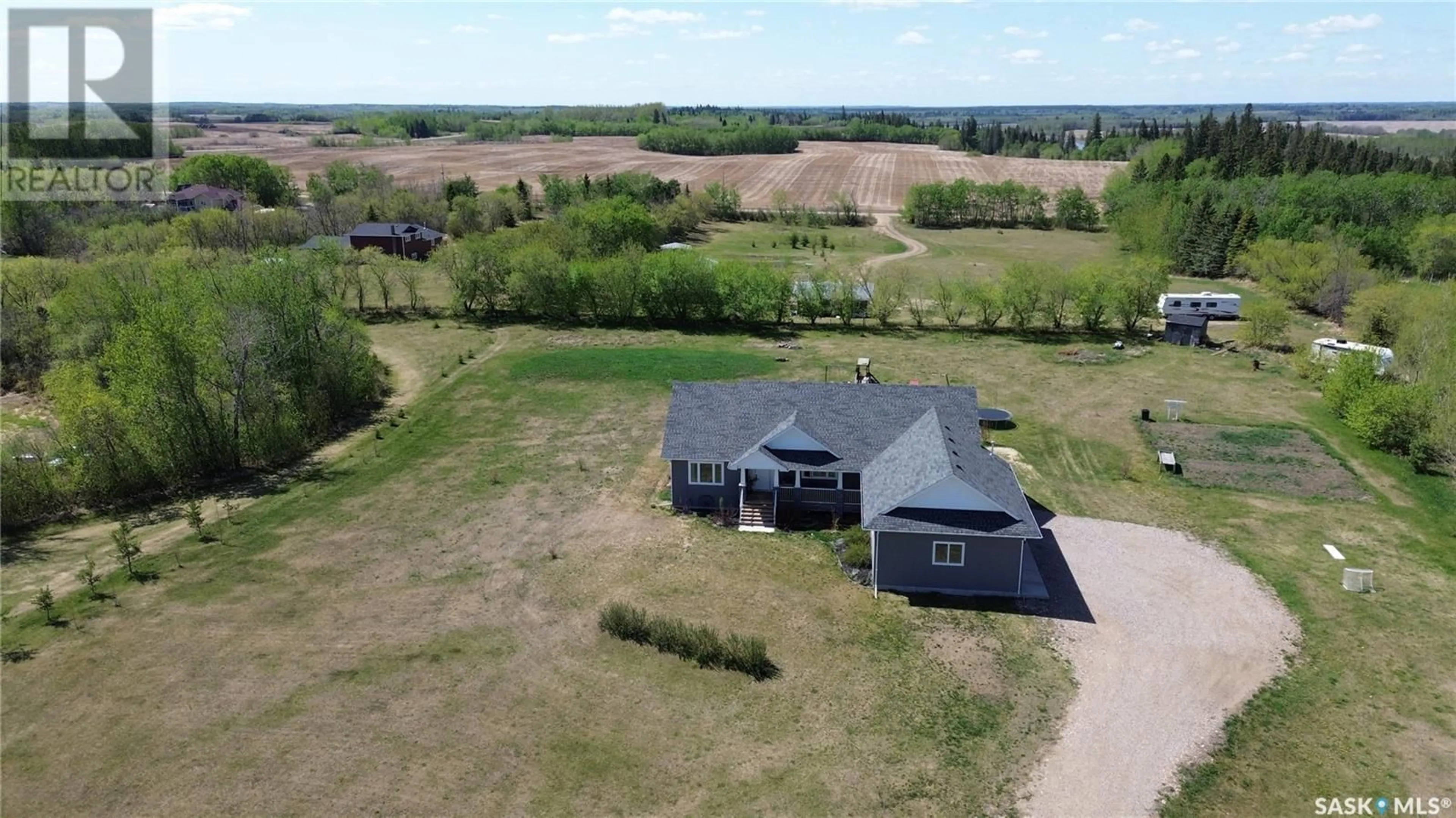 A pic from outside/outdoor area/front of a property/back of a property/a pic from drone, unknown for 302 WEST ACREAGE, Prince Albert Rm No. 461 Saskatchewan S6V5R8