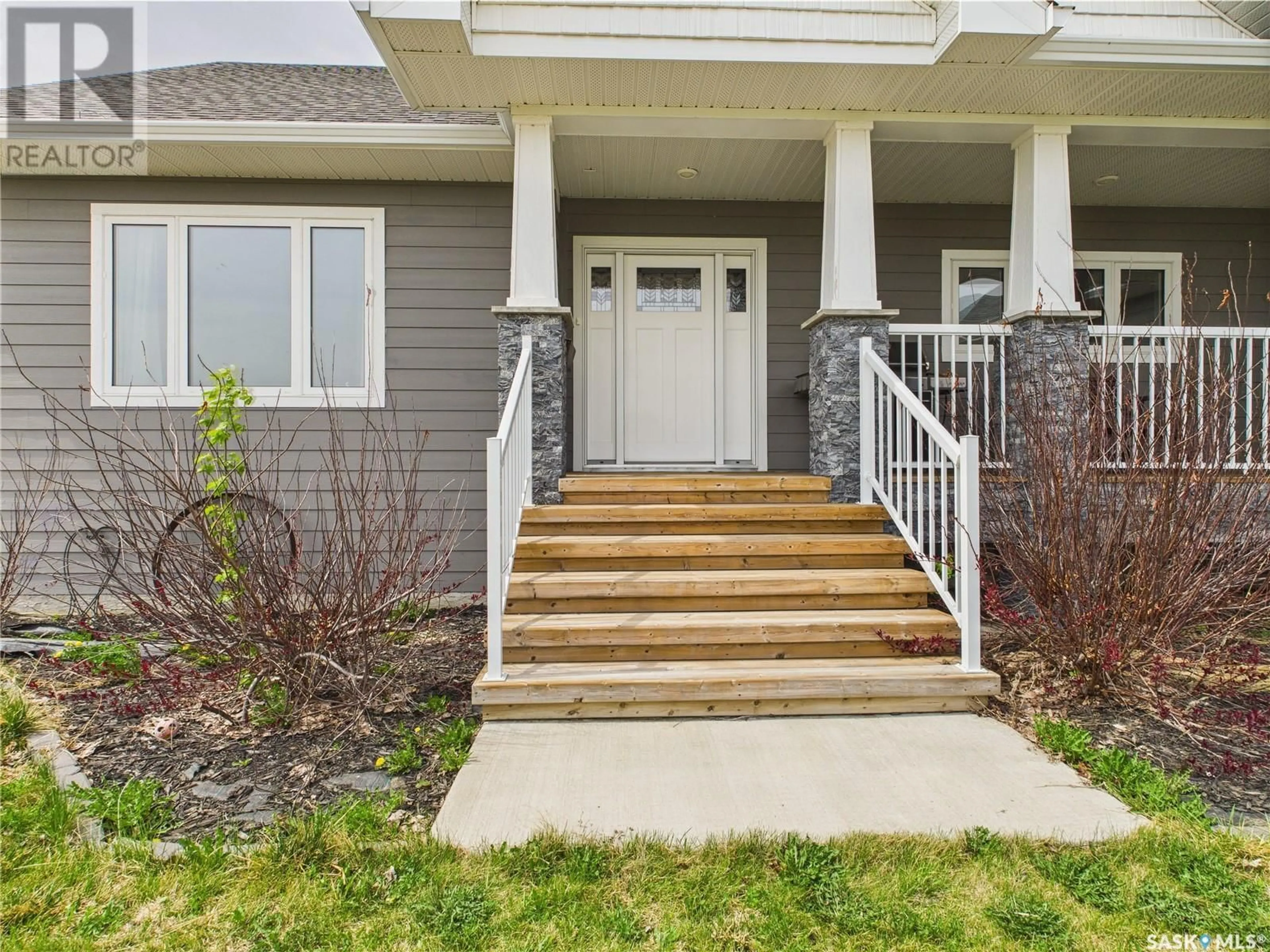 Home with vinyl exterior material, street for 302 WEST ACREAGE, Prince Albert Rm No. 461 Saskatchewan S6V5R8