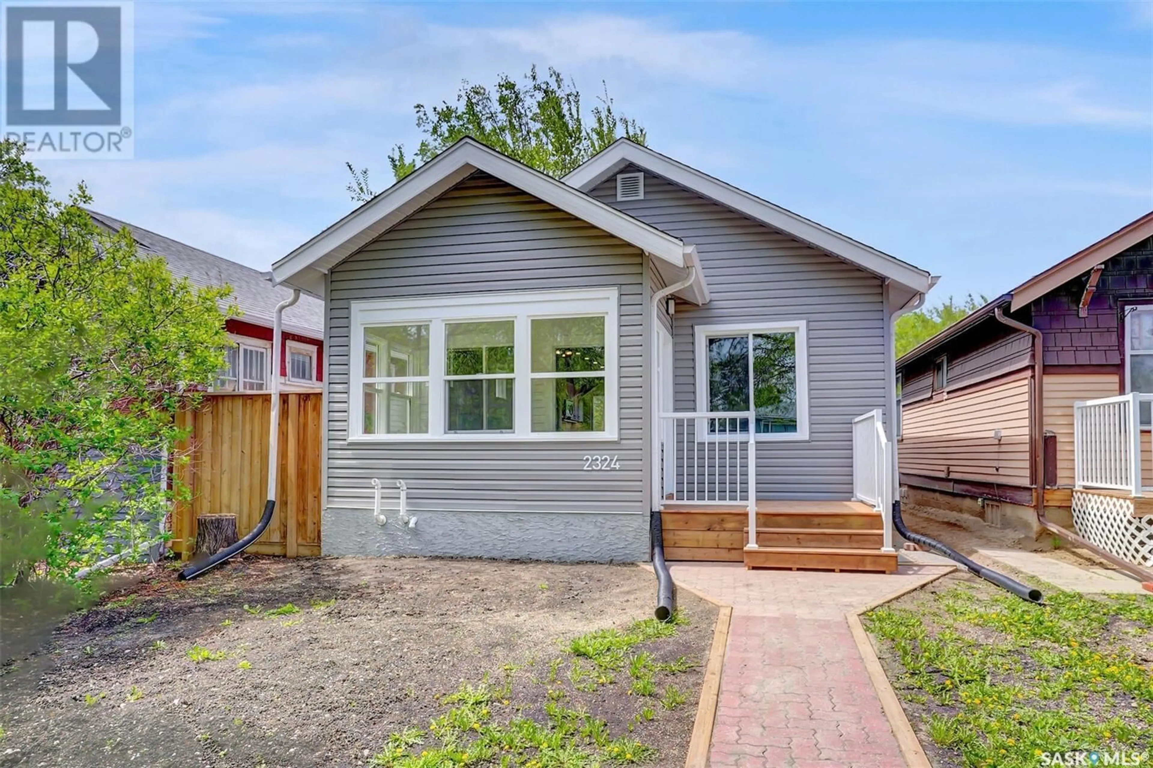 Home with vinyl exterior material, street for 2324 WALLACE STREET, Regina Saskatchewan S4N4A9