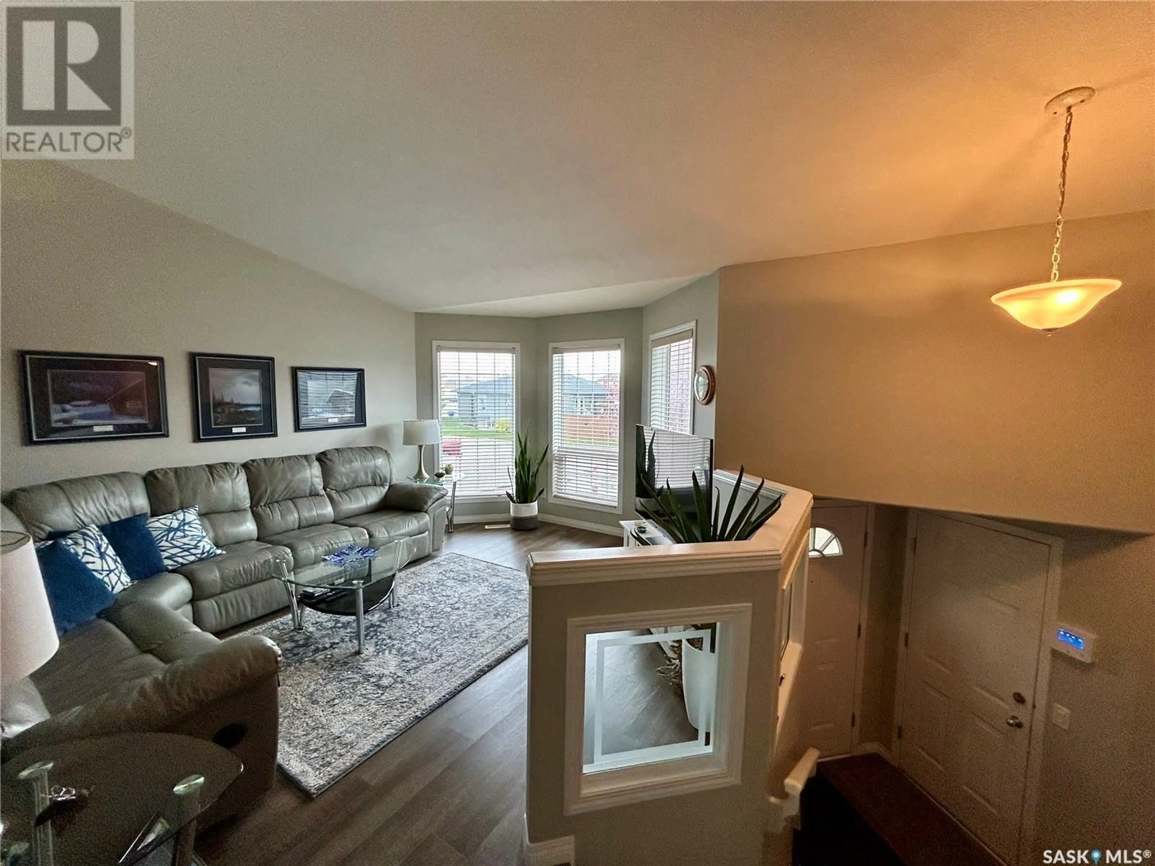Living room with furniture, unknown for 214 PETERS COVE, Saskatoon Saskatchewan S7N4T4