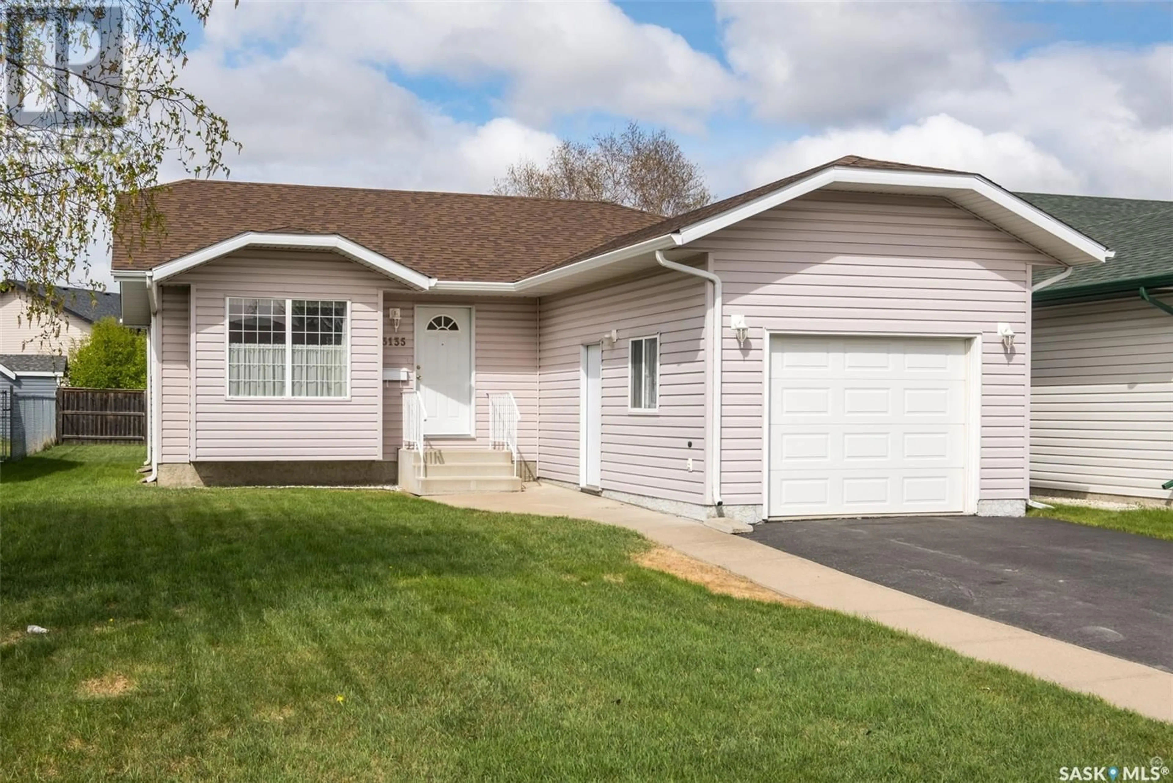 Home with vinyl exterior material, street for 3135 5TH AVENUE, Prince Albert Saskatchewan S6V8C4