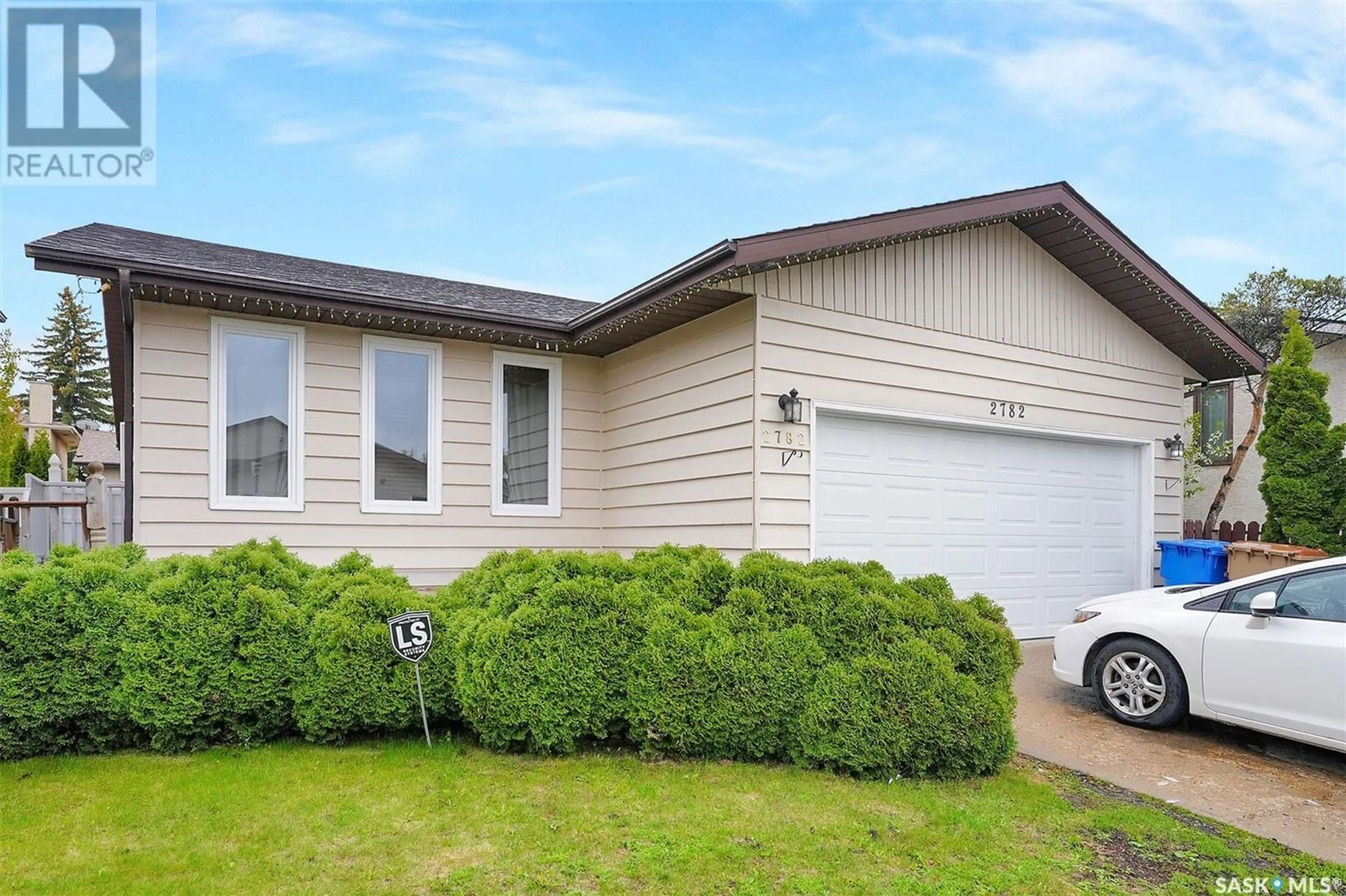 Home with vinyl exterior material, street for 2782 SCHWEITZER DRIVE, Regina Saskatchewan S4V1C5